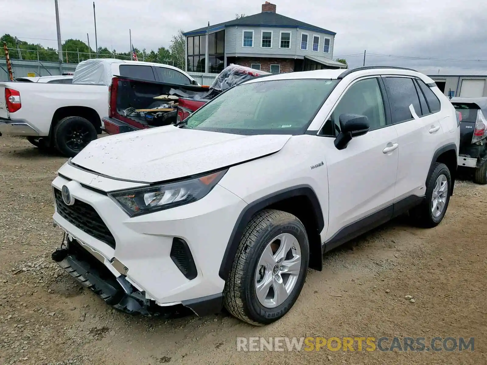 2 Photograph of a damaged car JTMLWRFV3KD028826 TOYOTA RAV4 LE 2019