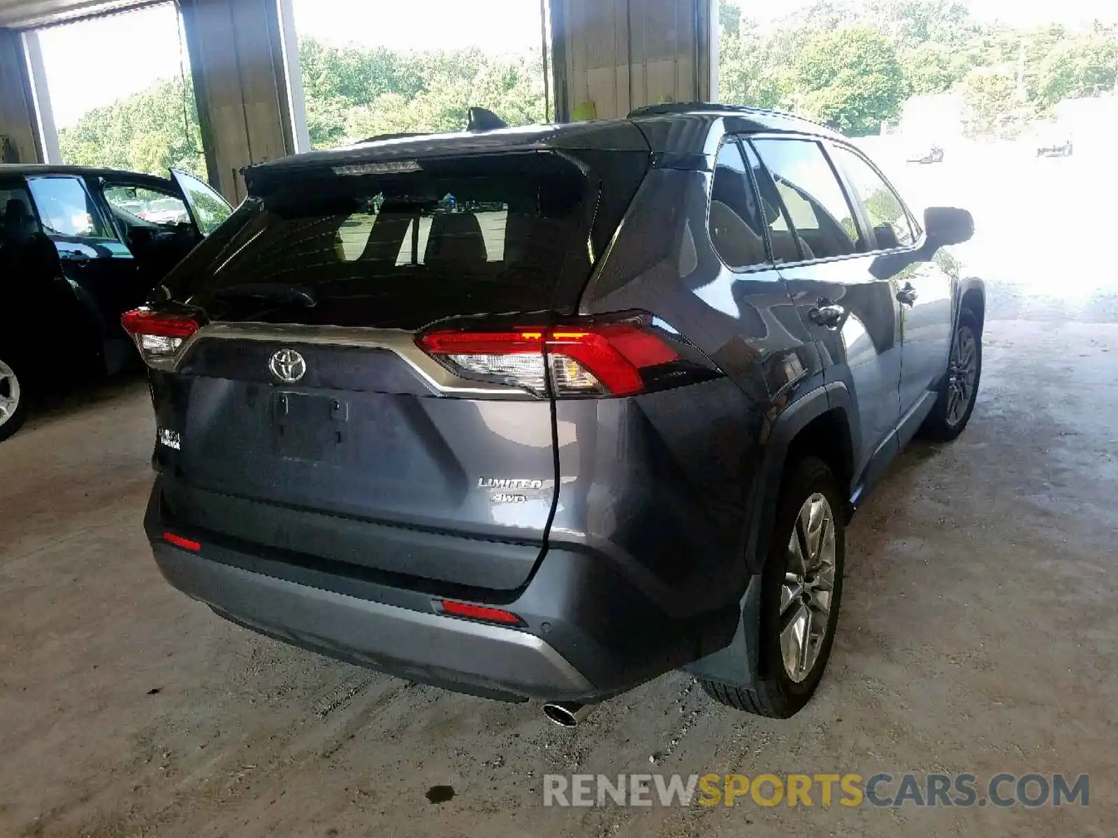 4 Photograph of a damaged car JTMN1RFV8KD514393 TOYOTA RAV4 LIMIT 2019