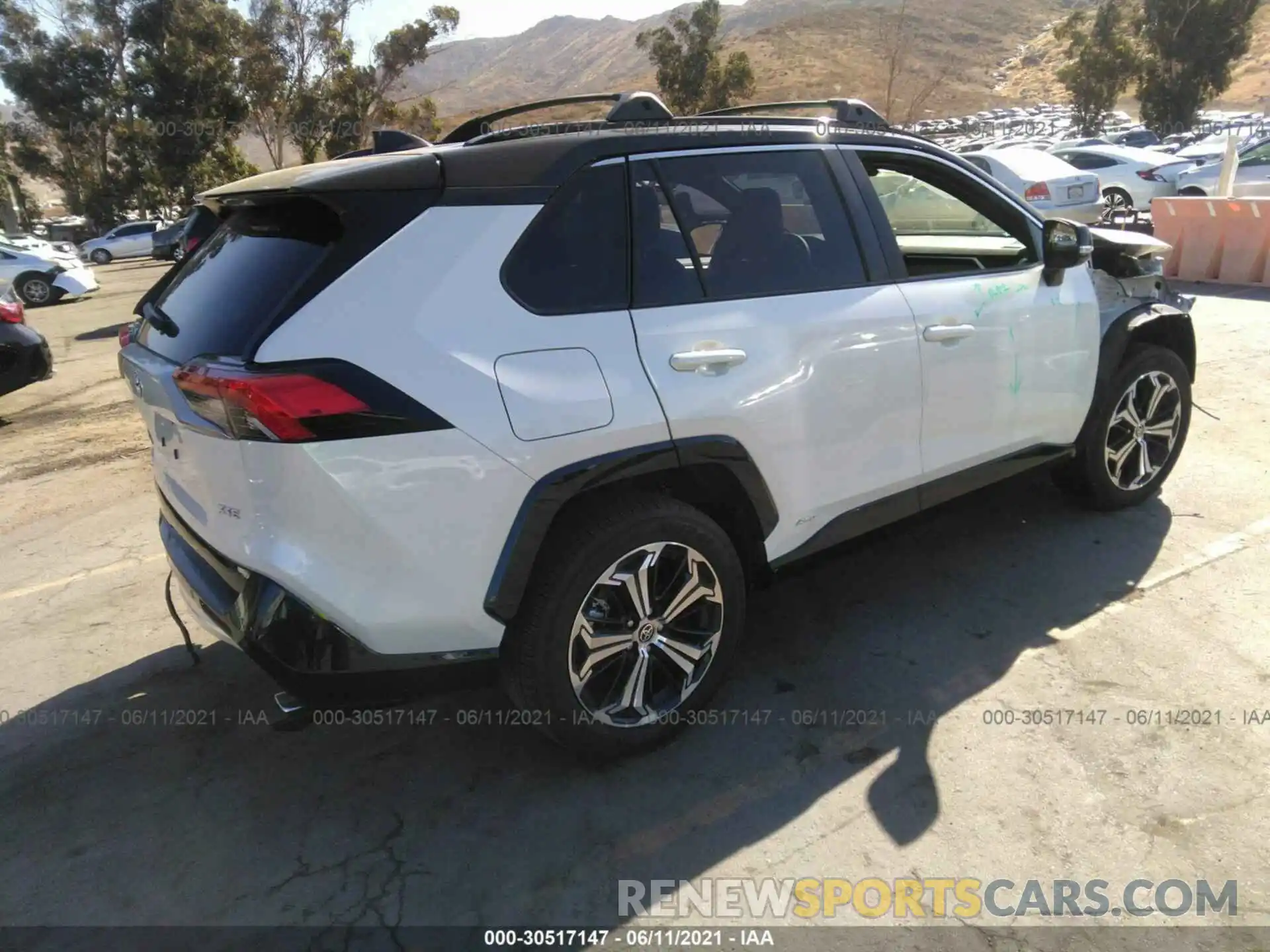 4 Photograph of a damaged car JTMFB3FV5MD012751 TOYOTA RAV4 PRIME 2021