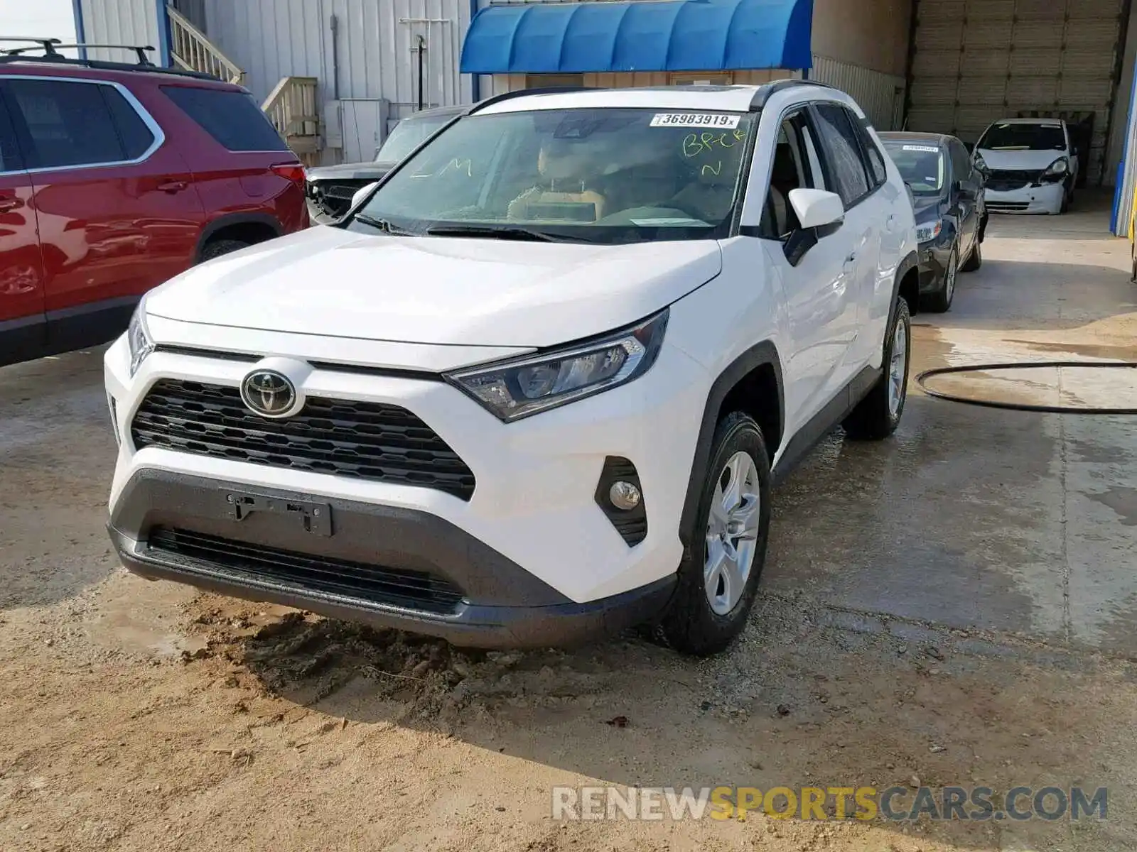 2 Photograph of a damaged car 2T3W1RFV4KW013914 TOYOTA RAV4 XLE 2019