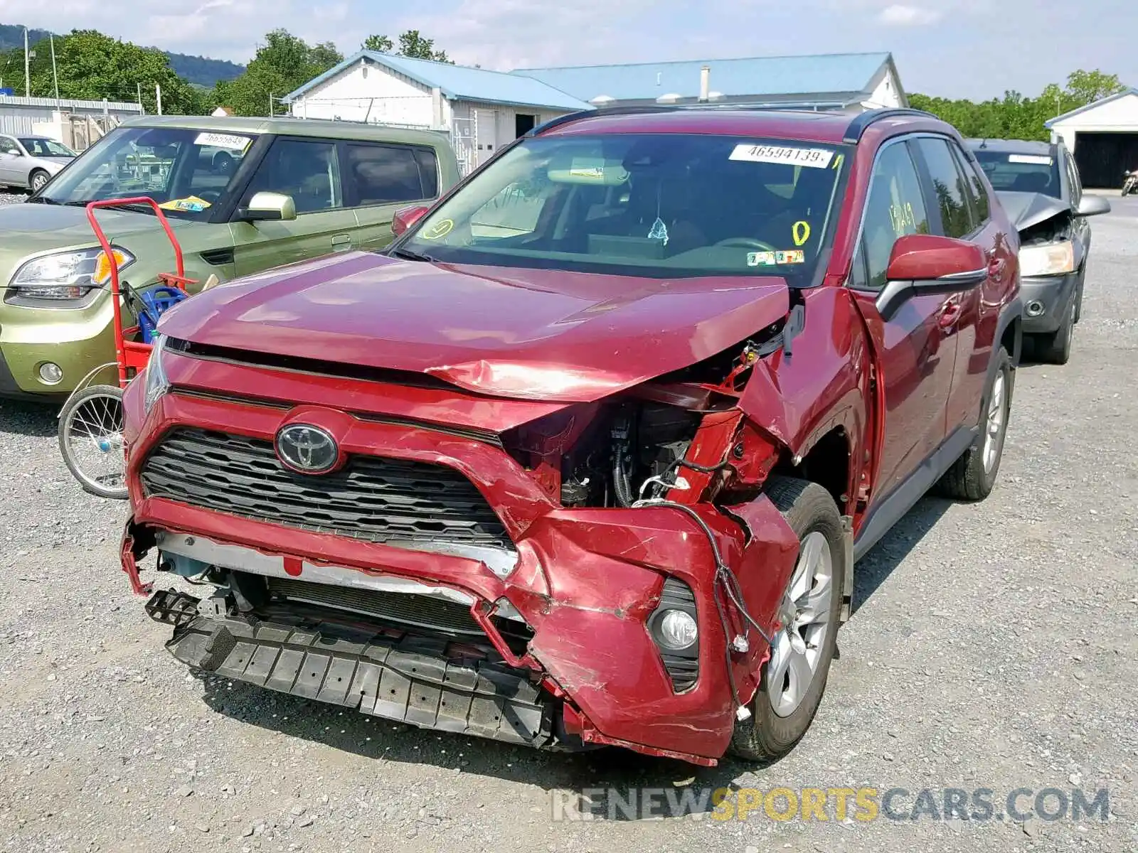 2 Photograph of a damaged car JTMP1RFV0KD013894 TOYOTA RAV4 XLE 2019