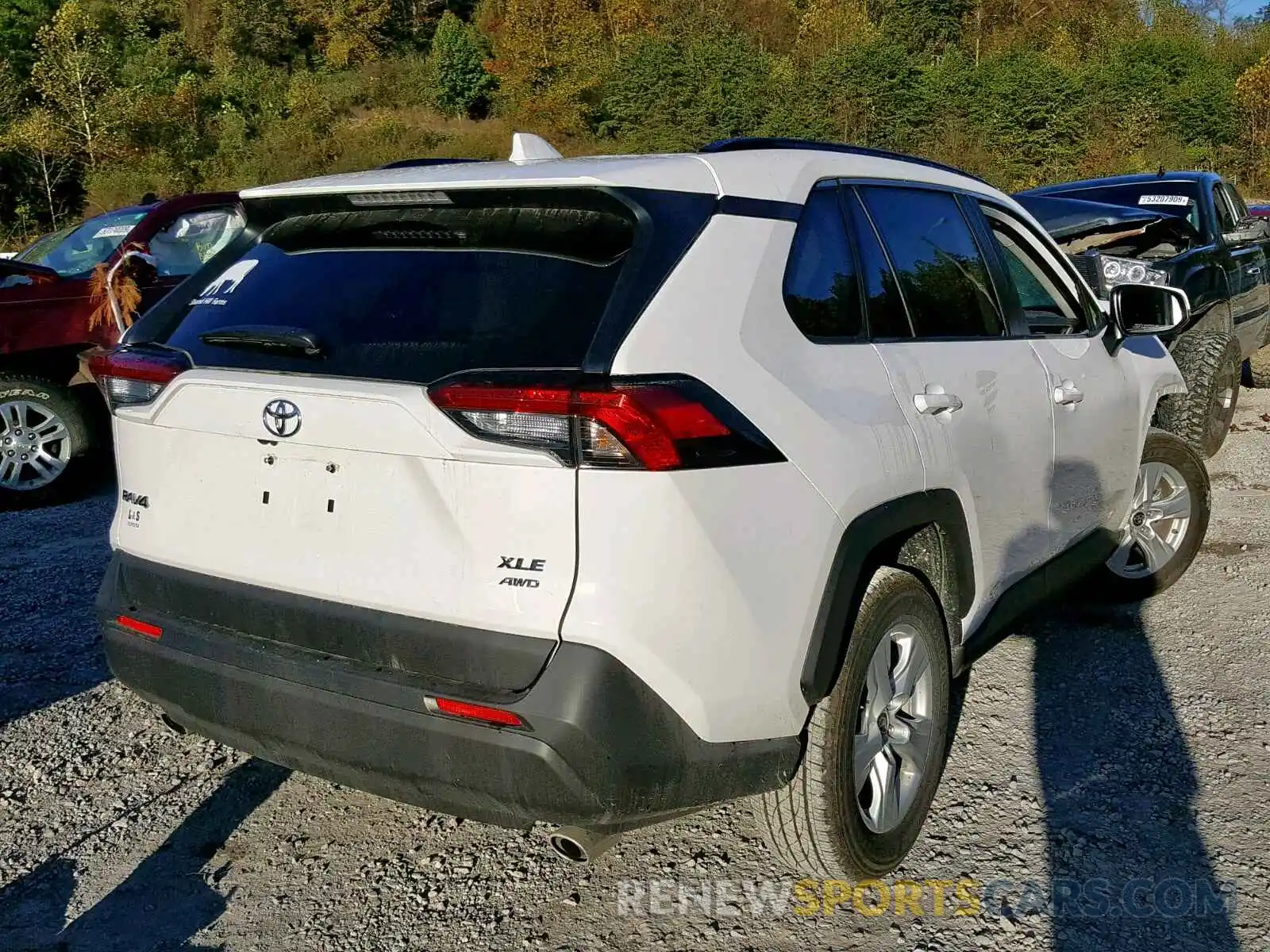 4 Photograph of a damaged car JTMP1RFV0KD028752 TOYOTA RAV4 XLE 2019