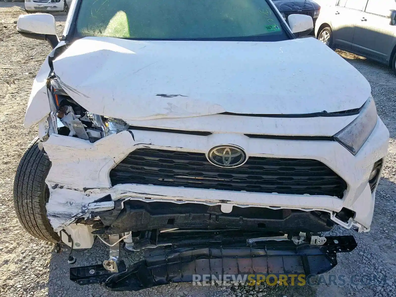 7 Photograph of a damaged car JTMP1RFV0KD028752 TOYOTA RAV4 XLE 2019