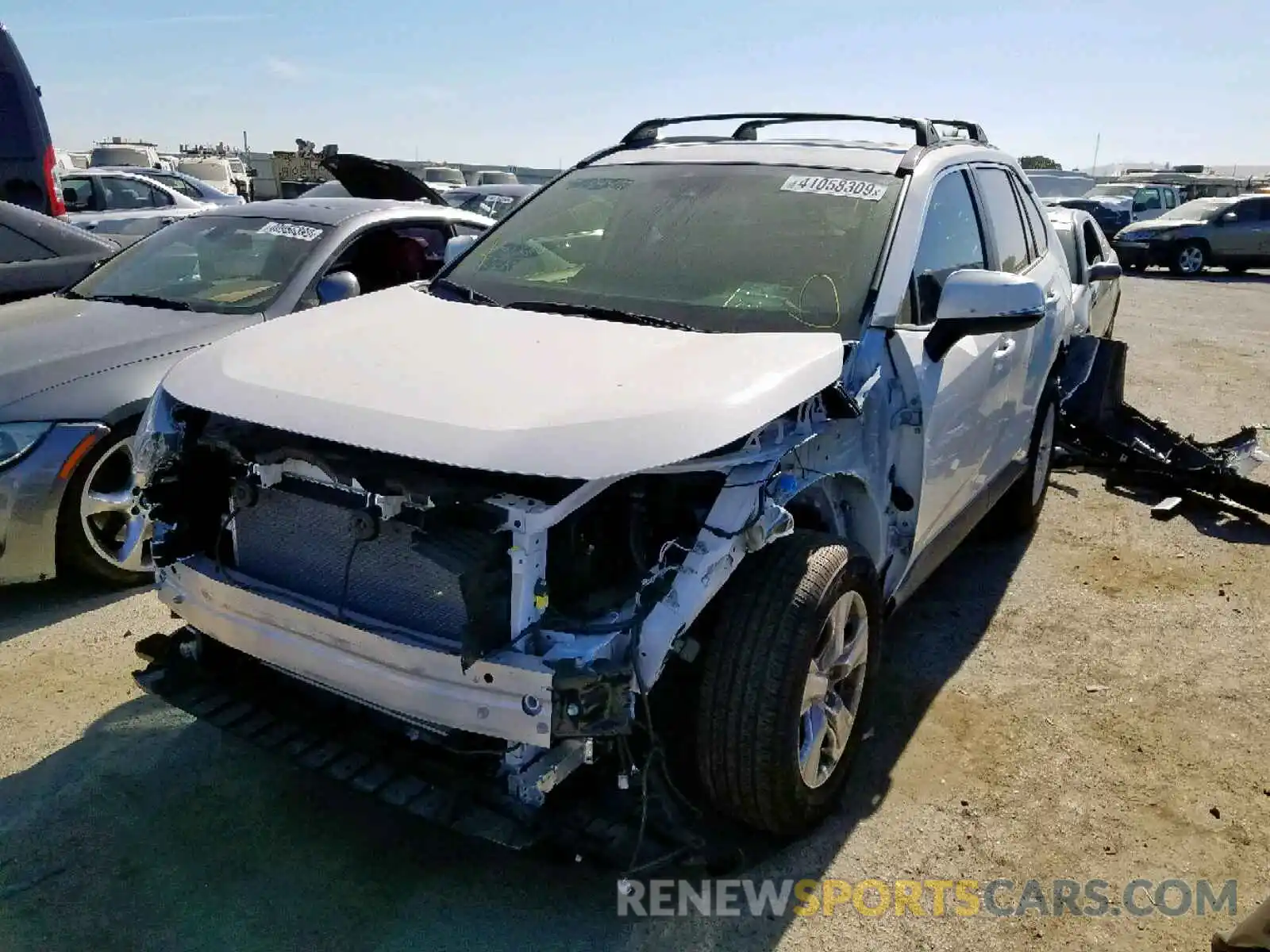 2 Photograph of a damaged car JTMP1RFV3KD511961 TOYOTA RAV4 XLE 2019