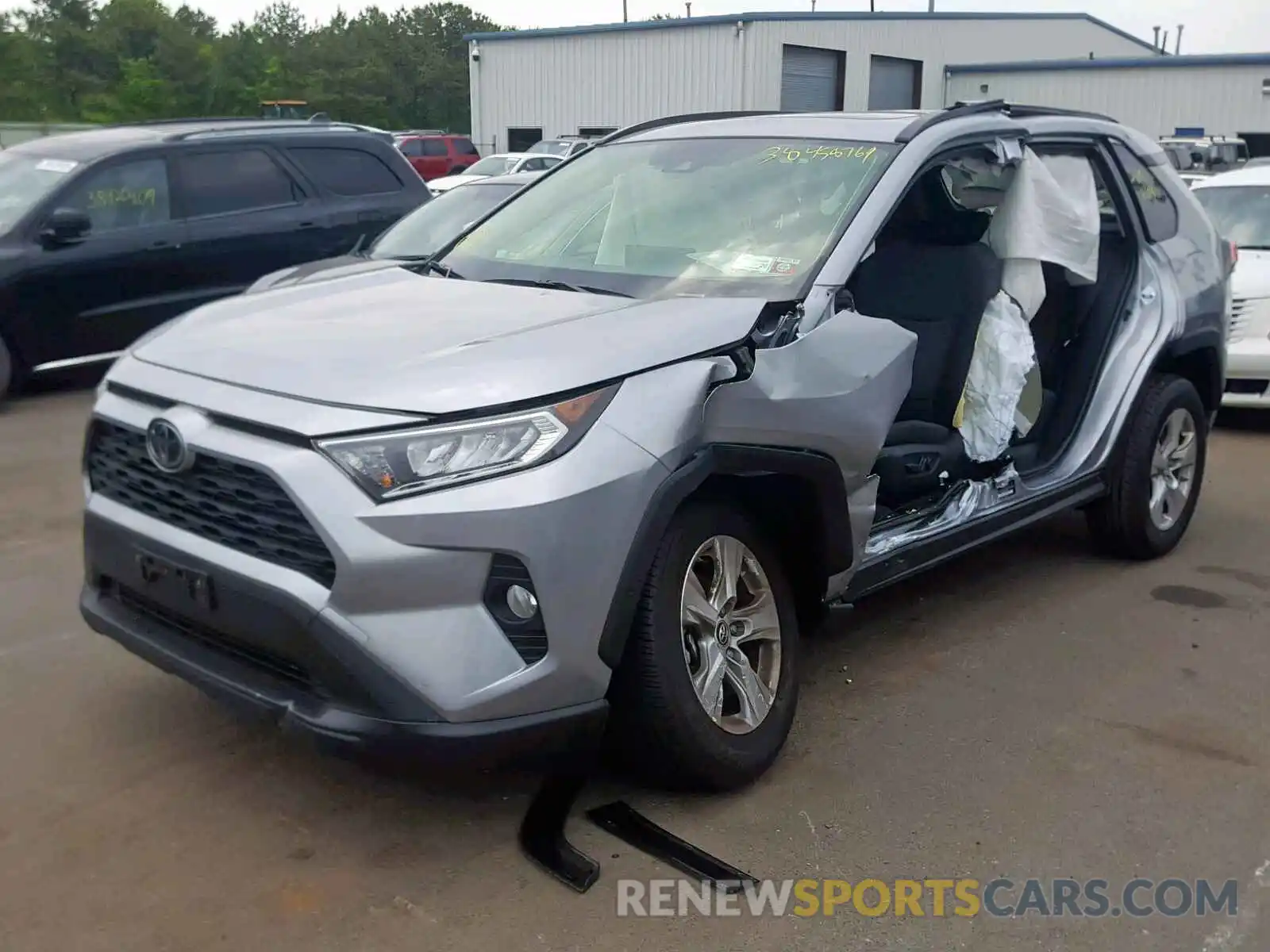 2 Photograph of a damaged car JTMP1RFV6KD511579 TOYOTA RAV4 XLE 2019