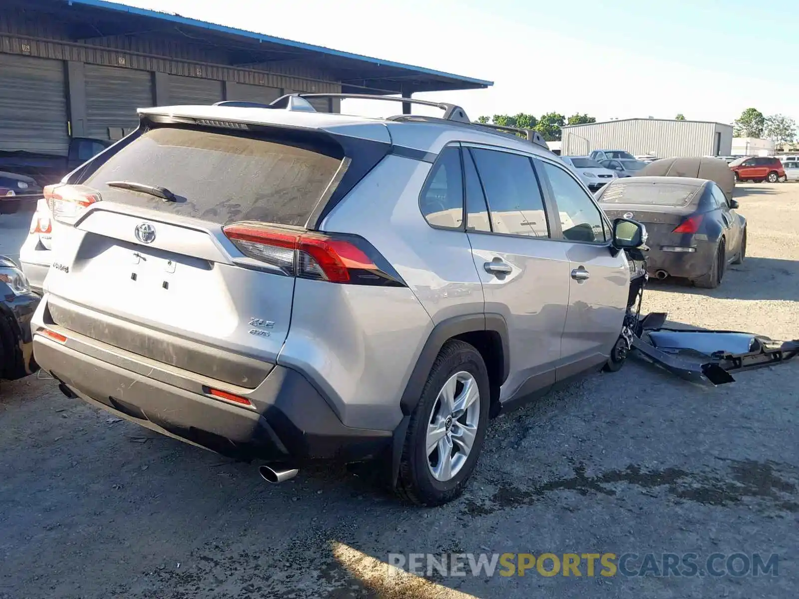 4 Photograph of a damaged car JTMP1RFV7KD019515 TOYOTA RAV4 XLE 2019