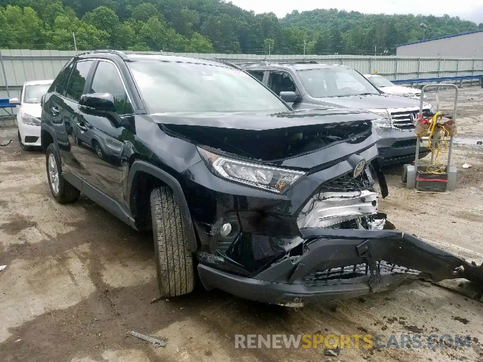 1 Photograph of a damaged car JTMP1RFV7KD503197 TOYOTA RAV4 XLE 2019