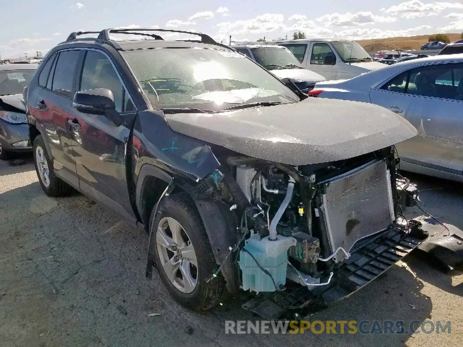 1 Photograph of a damaged car JTMP1RFV8KD006496 TOYOTA RAV4 XLE 2019