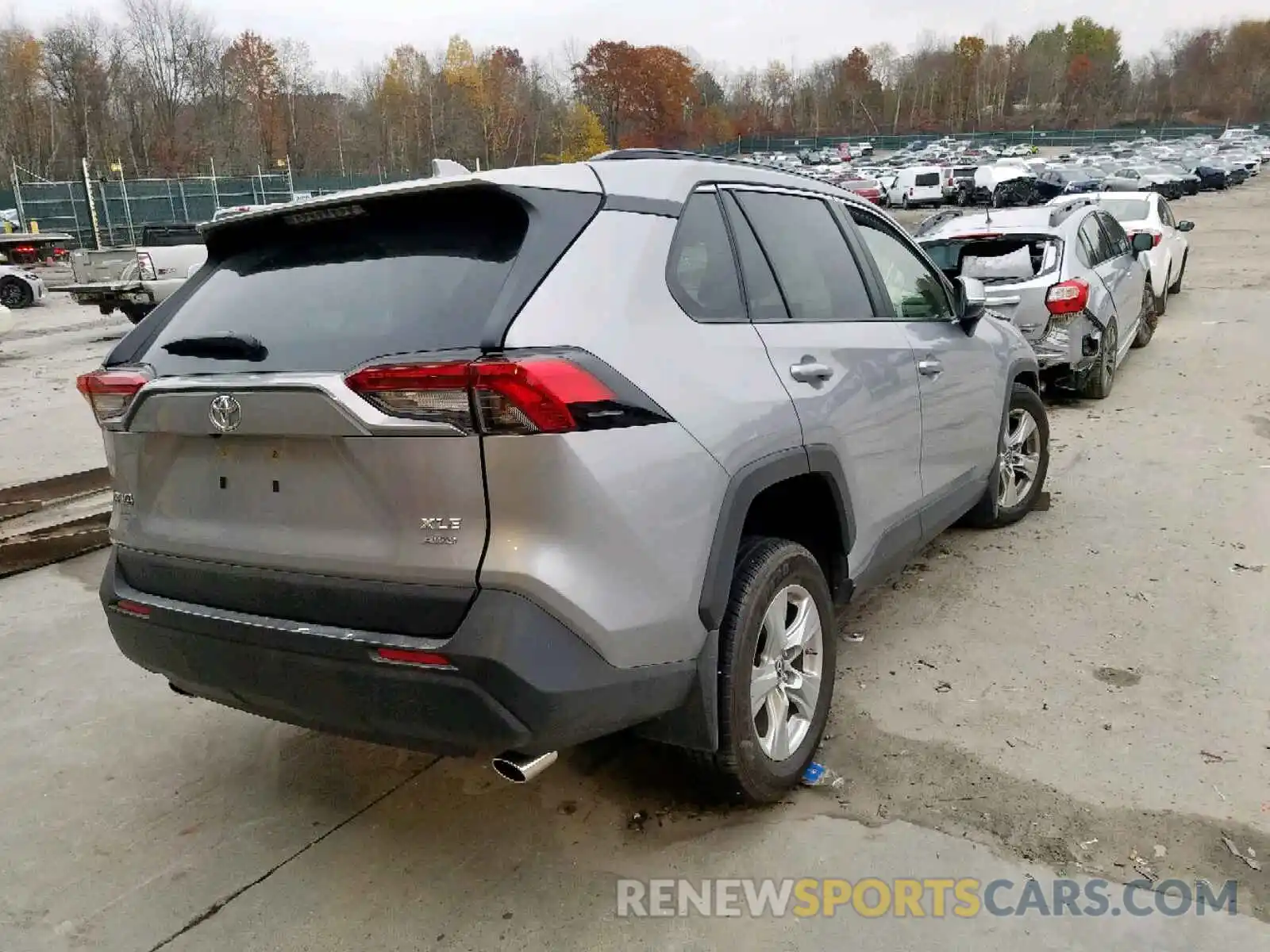 4 Photograph of a damaged car JTMP1RFV8KD031821 TOYOTA RAV4 XLE 2019