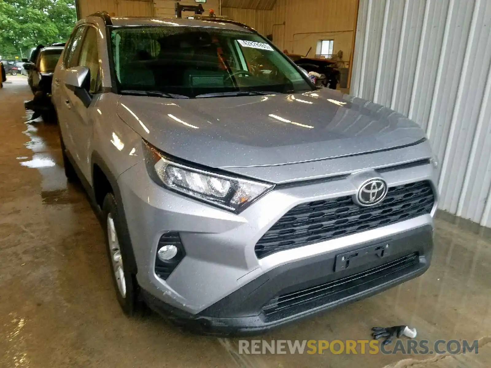 1 Photograph of a damaged car JTMP1RFVXKD511262 TOYOTA RAV4 XLE 2019