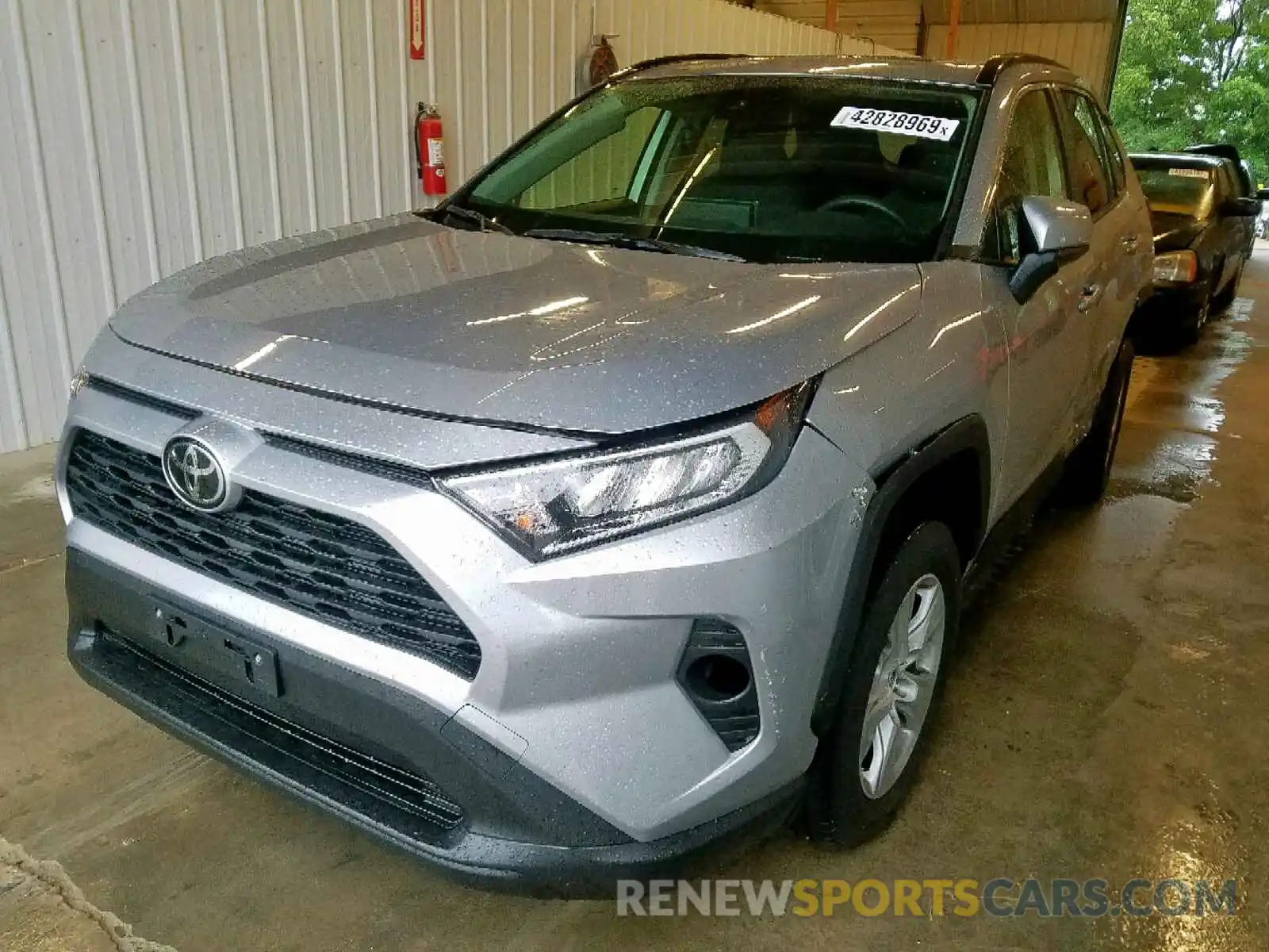 2 Photograph of a damaged car JTMP1RFVXKD511262 TOYOTA RAV4 XLE 2019