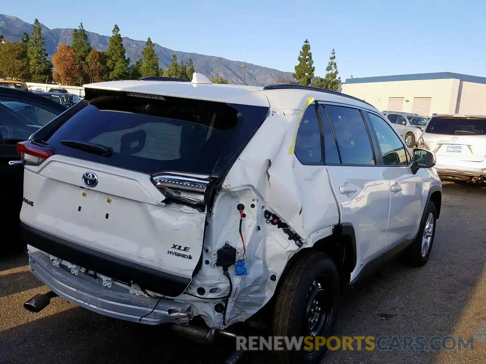 4 Photograph of a damaged car JTMRWRFV9KD004590 TOYOTA RAV4 XLE 2019