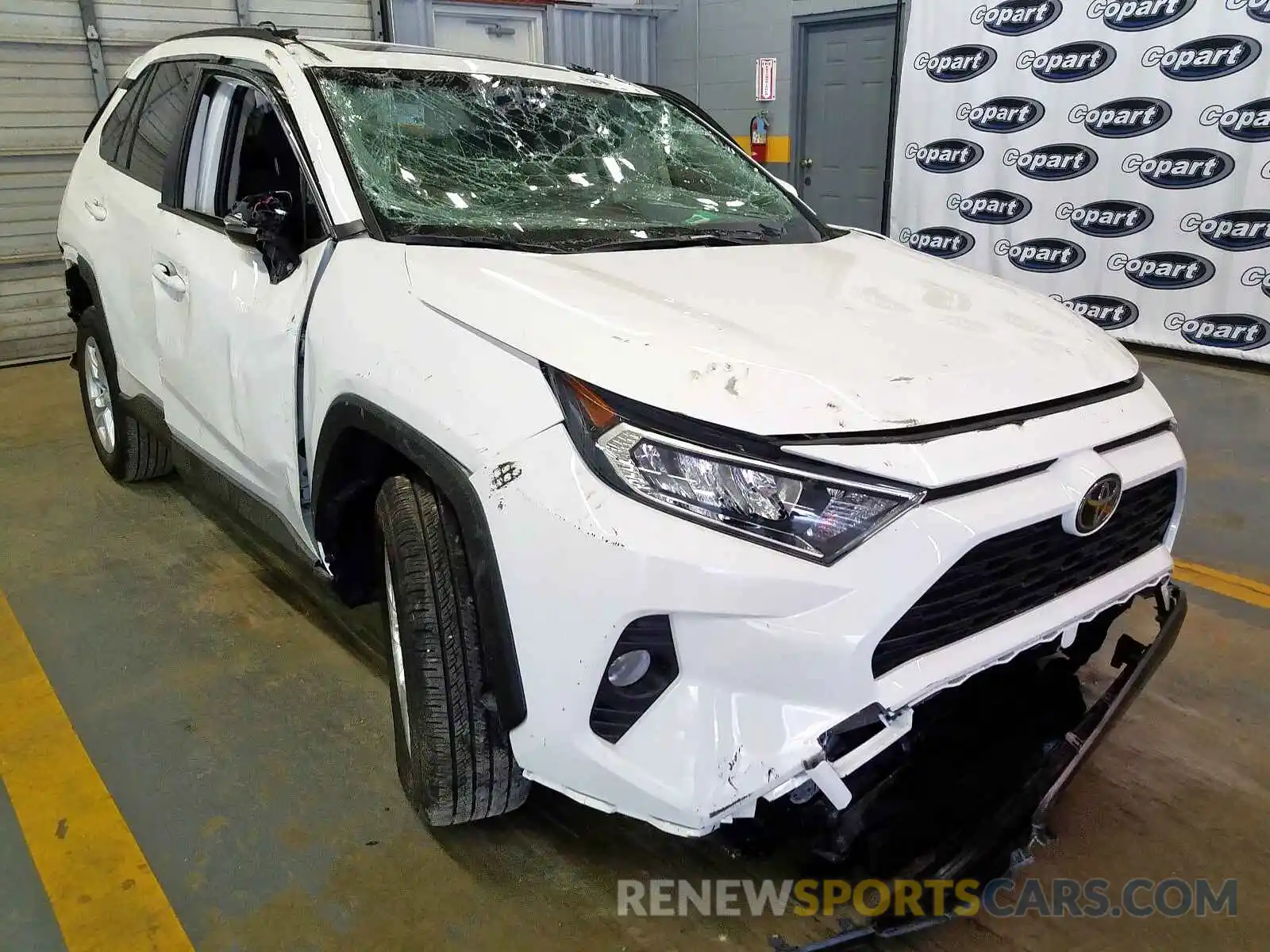 1 Photograph of a damaged car JTMW1RFV0KD019383 TOYOTA RAV4 XLE 2019