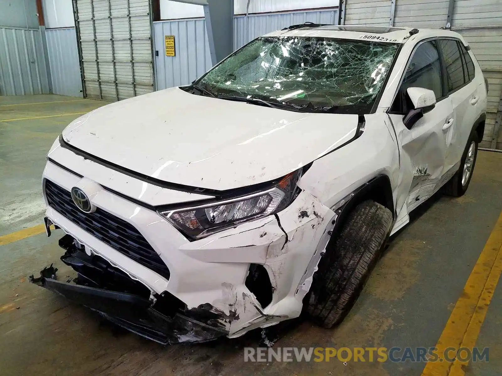 2 Photograph of a damaged car JTMW1RFV0KD019383 TOYOTA RAV4 XLE 2019