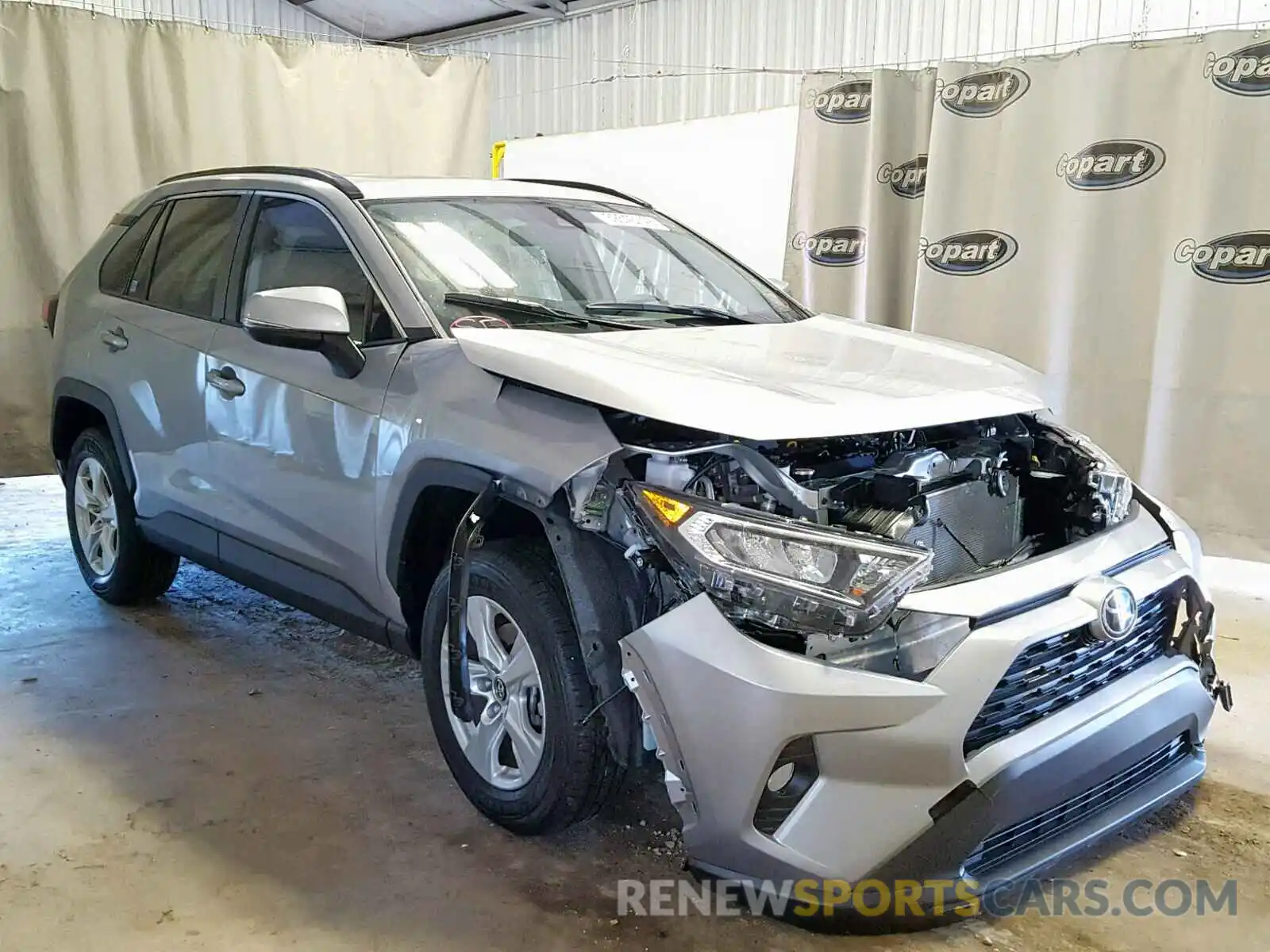 1 Photograph of a damaged car JTMW1RFV4KD017796 TOYOTA RAV4 XLE 2019