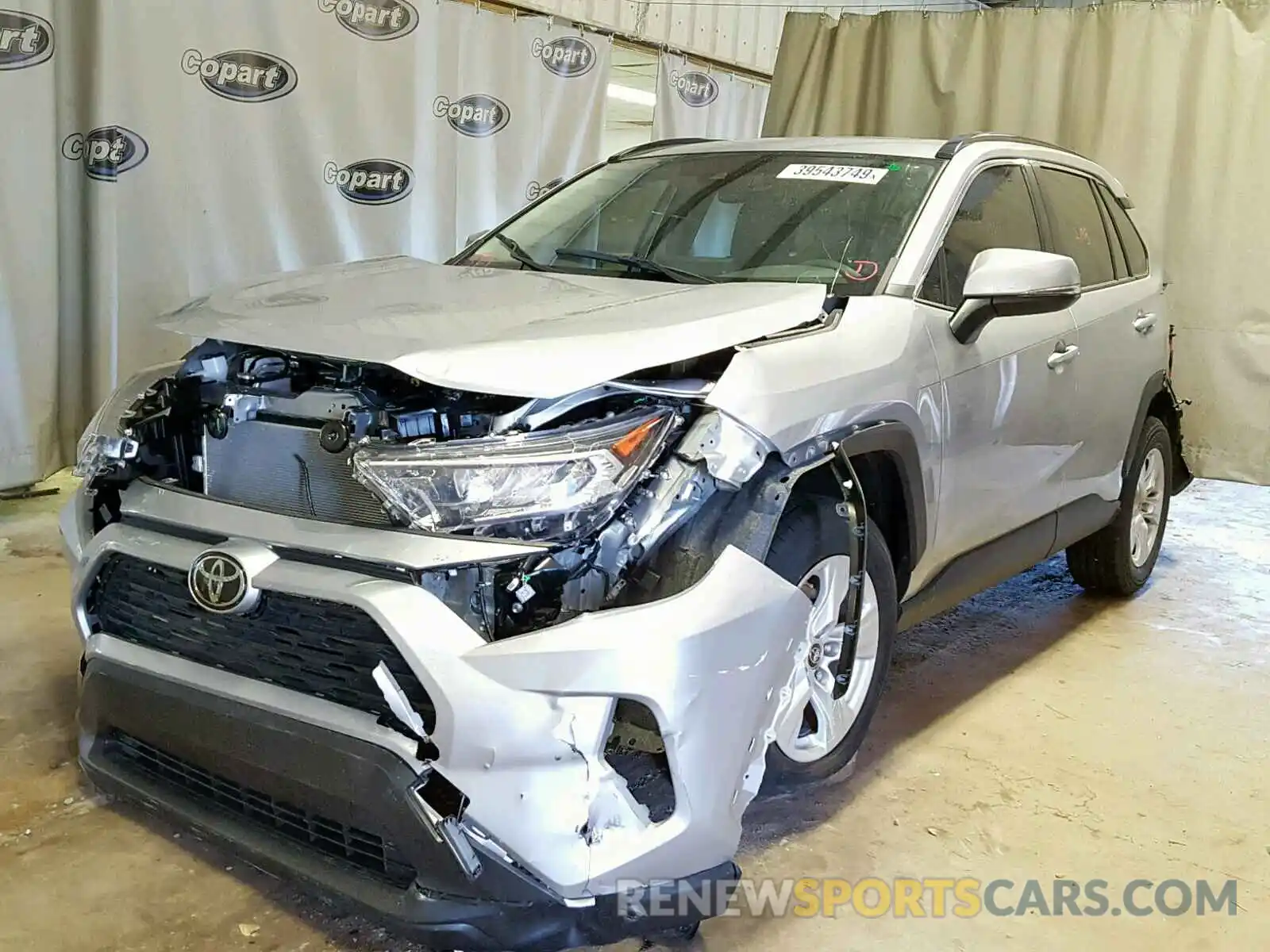 2 Photograph of a damaged car JTMW1RFV4KD017796 TOYOTA RAV4 XLE 2019