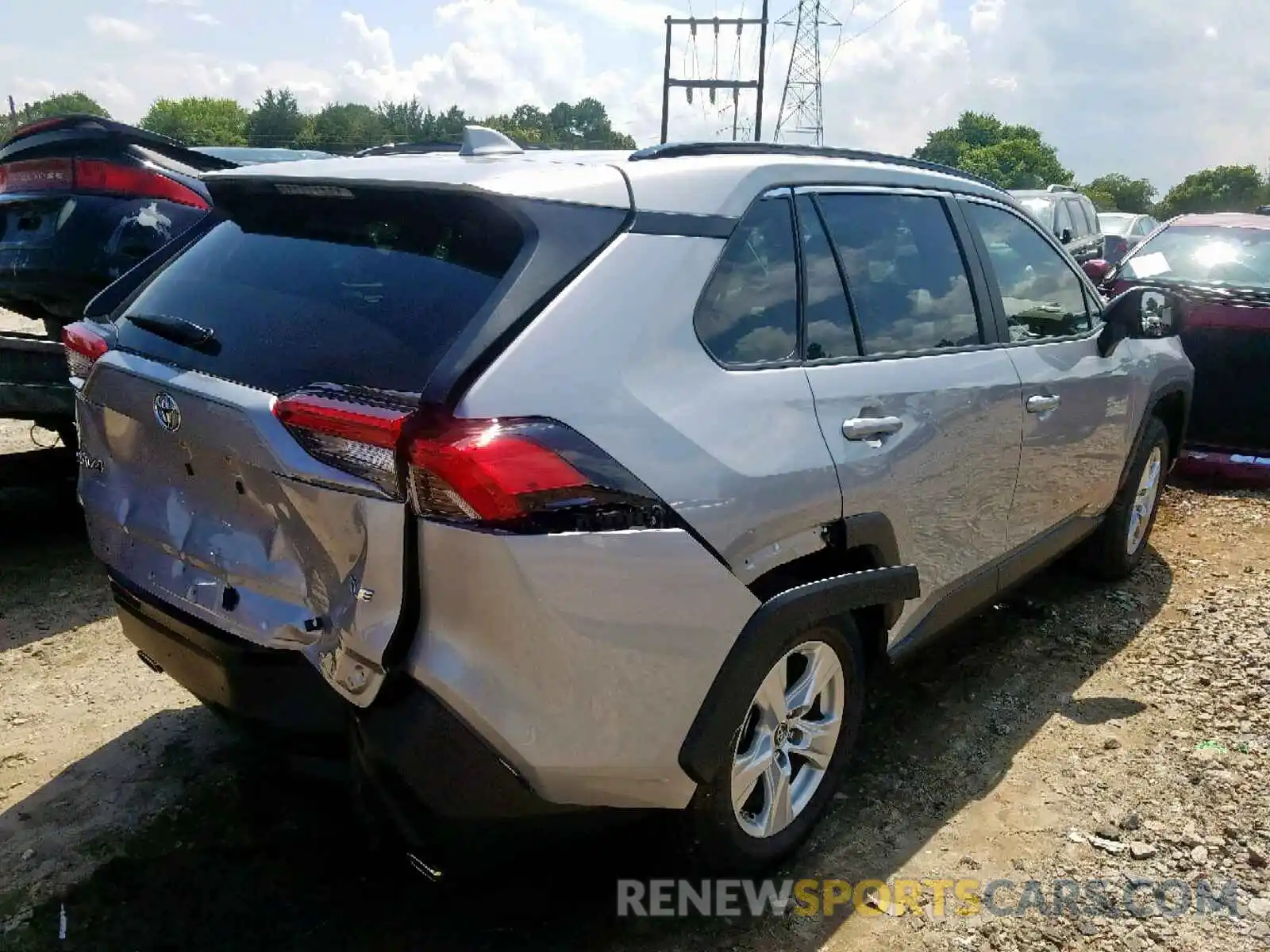 4 Photograph of a damaged car JTMW1RFV5KD004099 TOYOTA RAV4 XLE 2019