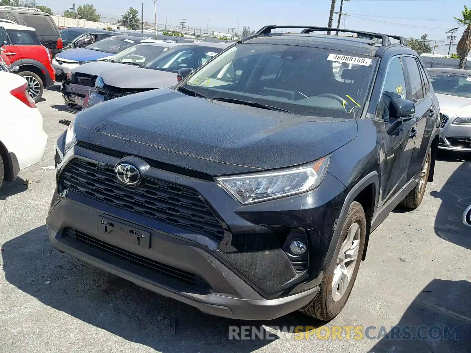 2 Photograph of a damaged car JTMW1RFV6KD009831 TOYOTA RAV4 XLE 2019