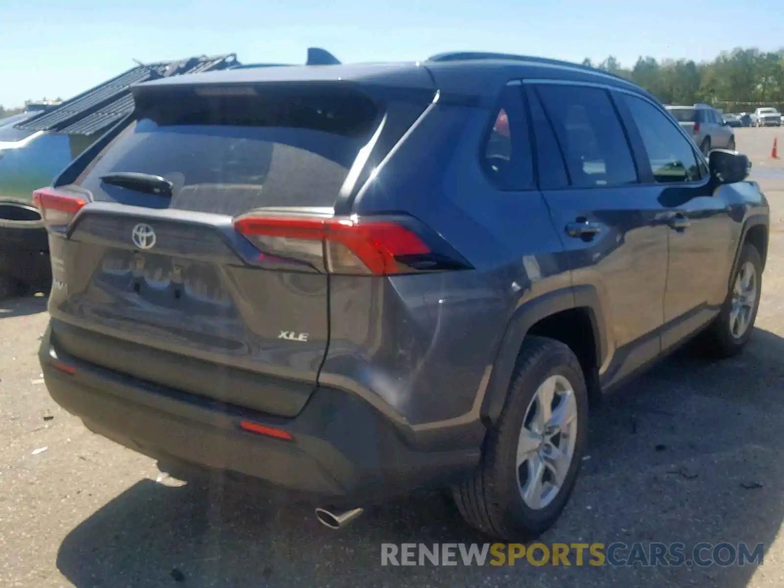 4 Photograph of a damaged car JTMW1RFV6KD013894 TOYOTA RAV4 XLE 2019