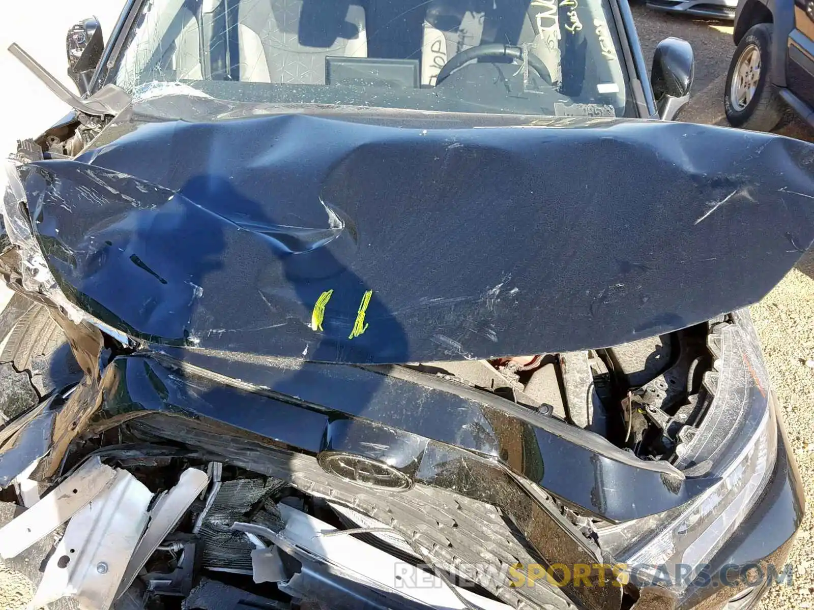 7 Photograph of a damaged car JTMW1RFV7KD004394 TOYOTA RAV4 XLE 2019