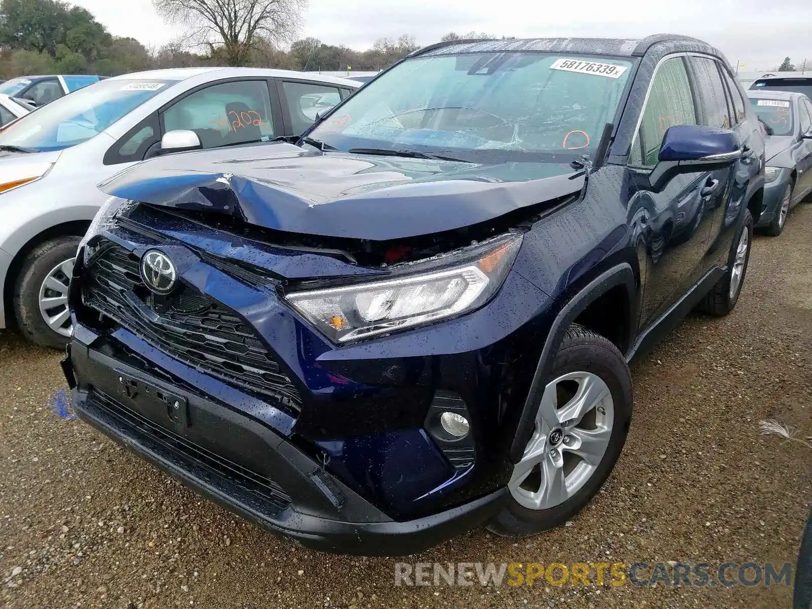 2 Photograph of a damaged car JTMW1RFV7KD027691 TOYOTA RAV4 XLE 2019