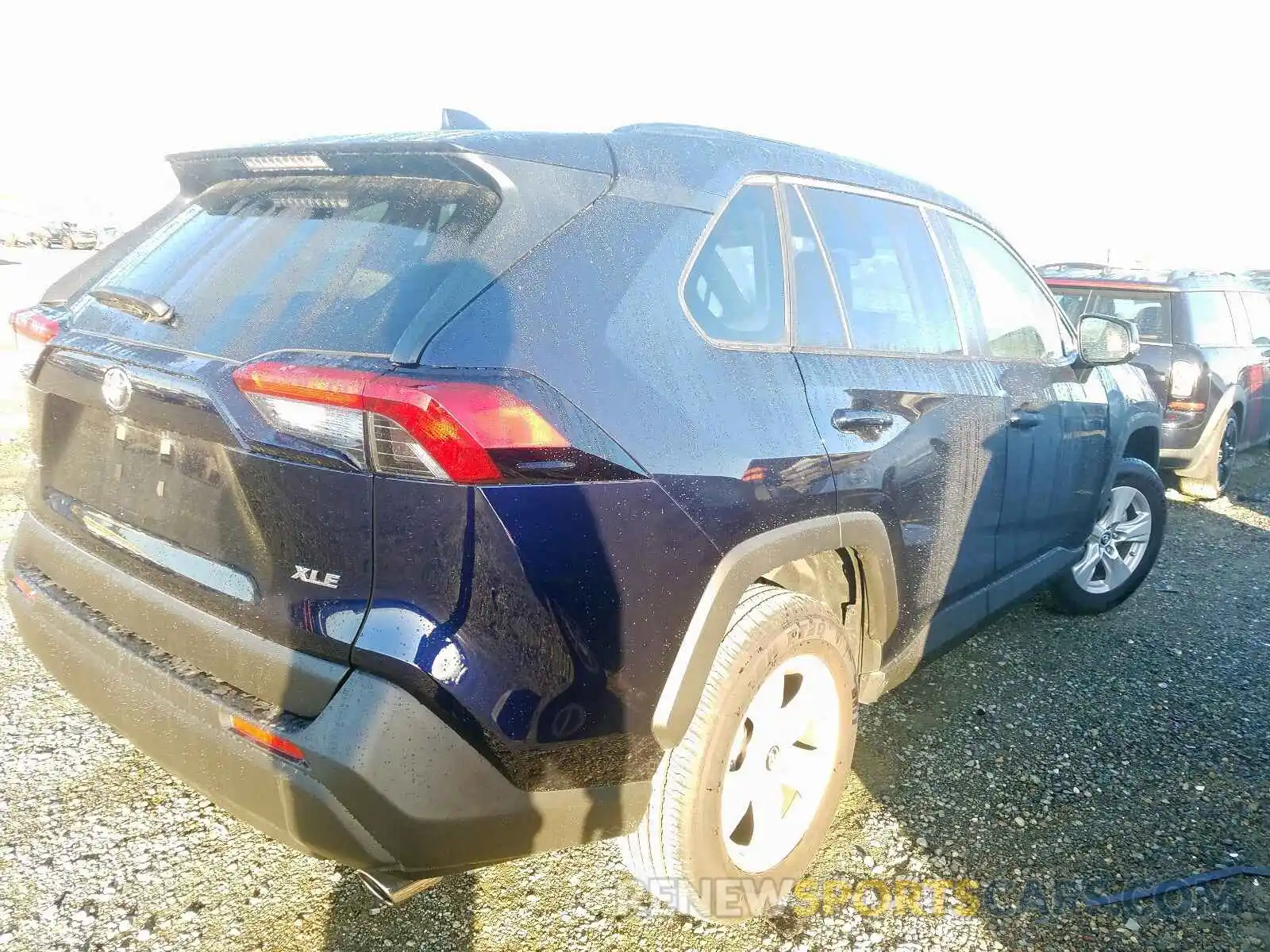 4 Photograph of a damaged car JTMW1RFV7KD027691 TOYOTA RAV4 XLE 2019