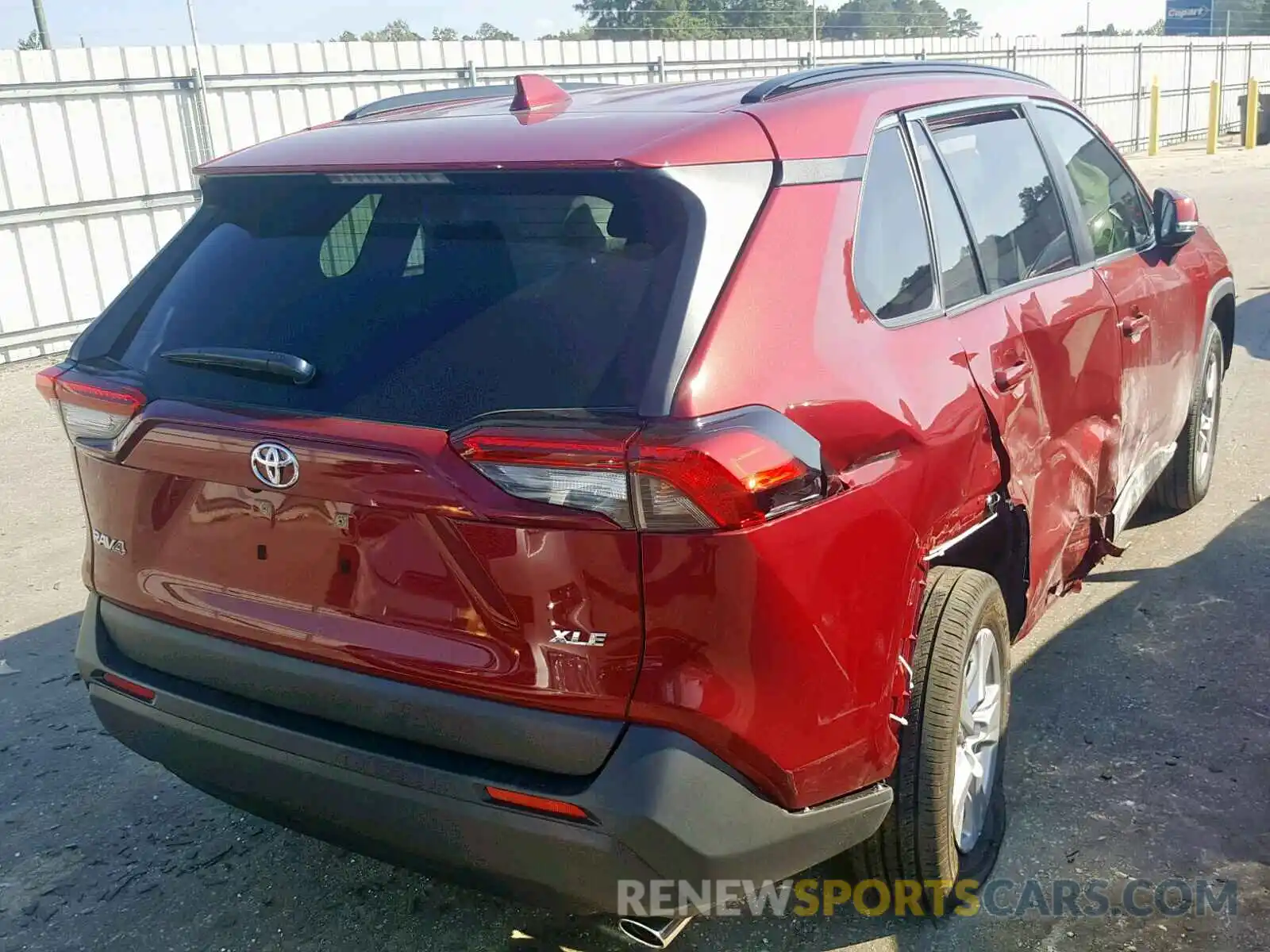 4 Photograph of a damaged car JTMW1RFV7KD032728 TOYOTA RAV4 XLE 2019