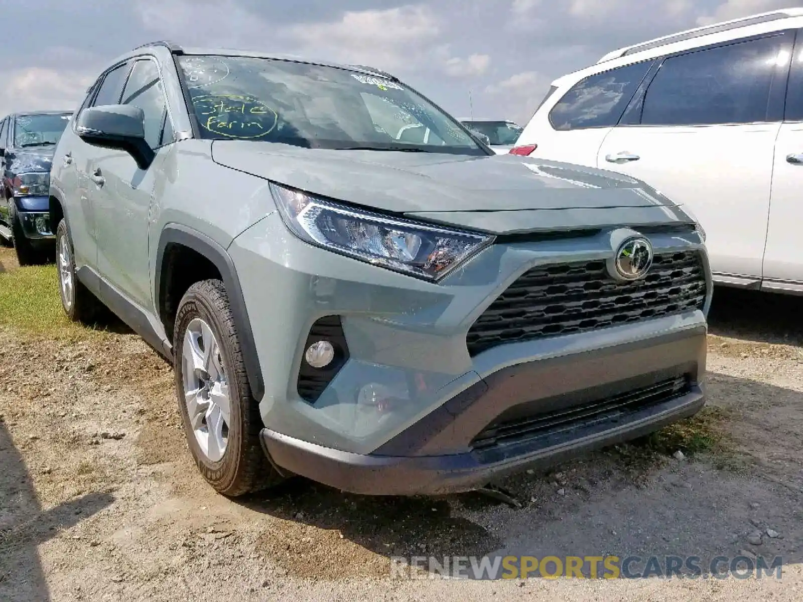 1 Photograph of a damaged car JTMW1RFV7KD512249 TOYOTA RAV4 XLE 2019