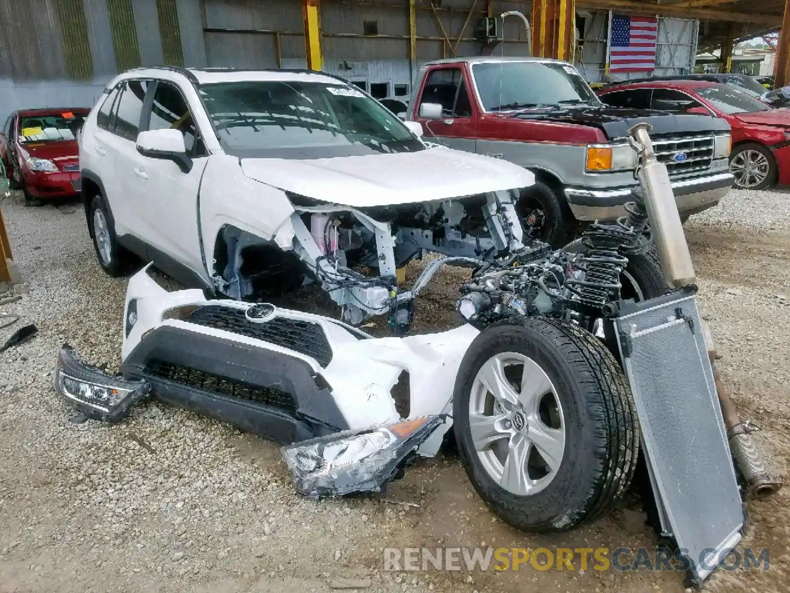 1 Photograph of a damaged car JTMW1RFV8KD020667 TOYOTA RAV4 XLE 2019