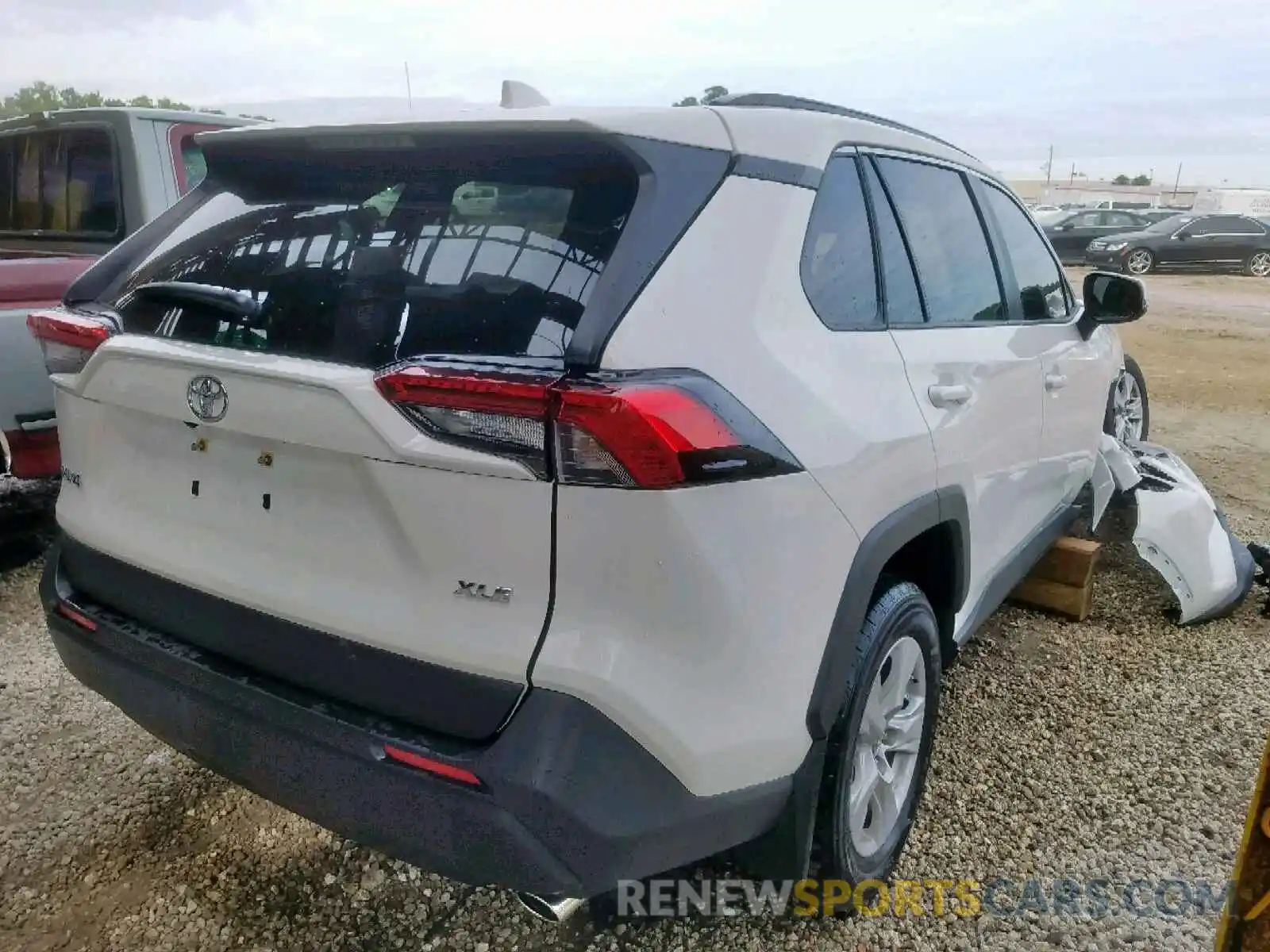 4 Photograph of a damaged car JTMW1RFV8KD020667 TOYOTA RAV4 XLE 2019