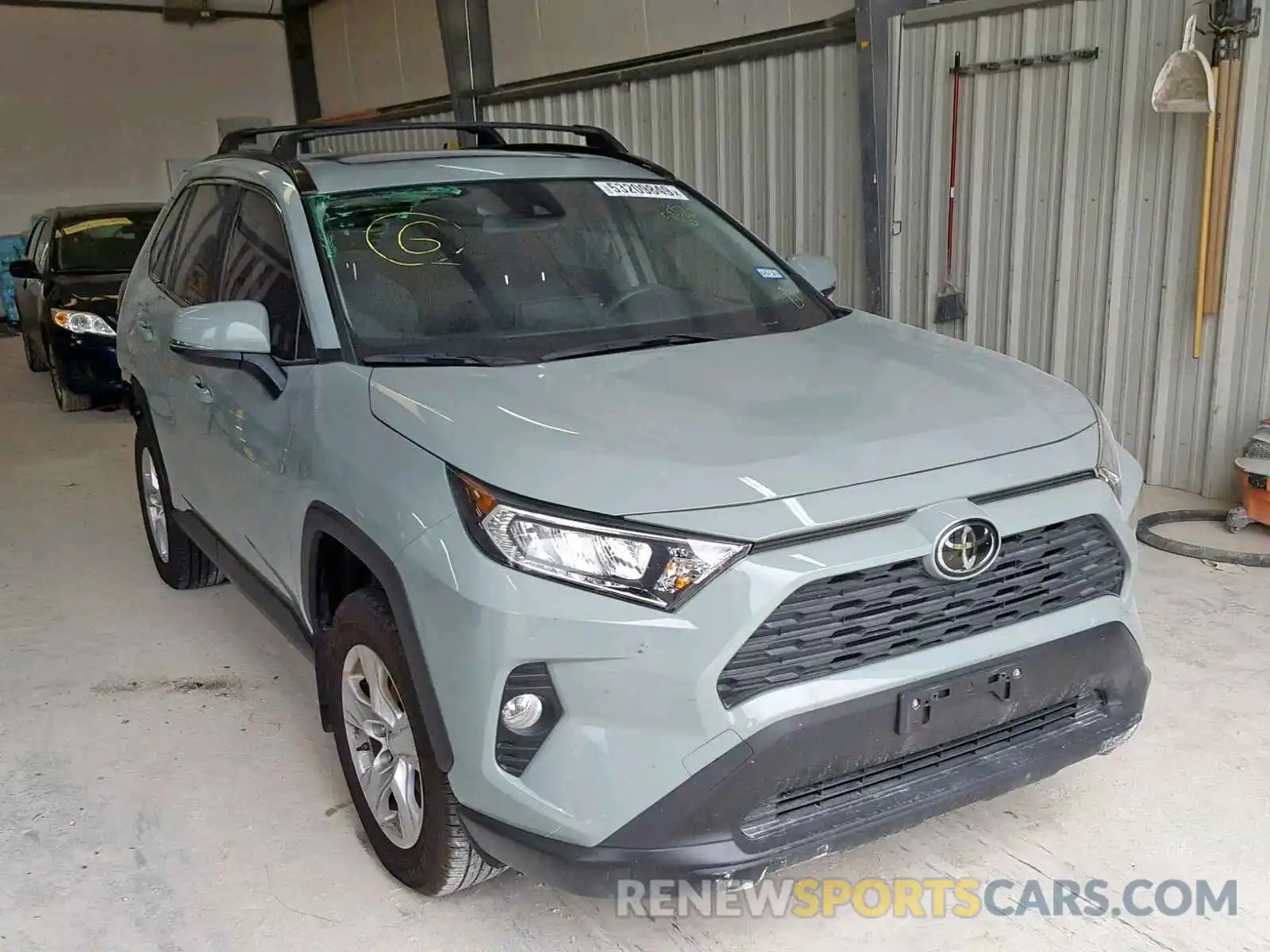 1 Photograph of a damaged car JTMW1RFV8KD505634 TOYOTA RAV4 XLE 2019