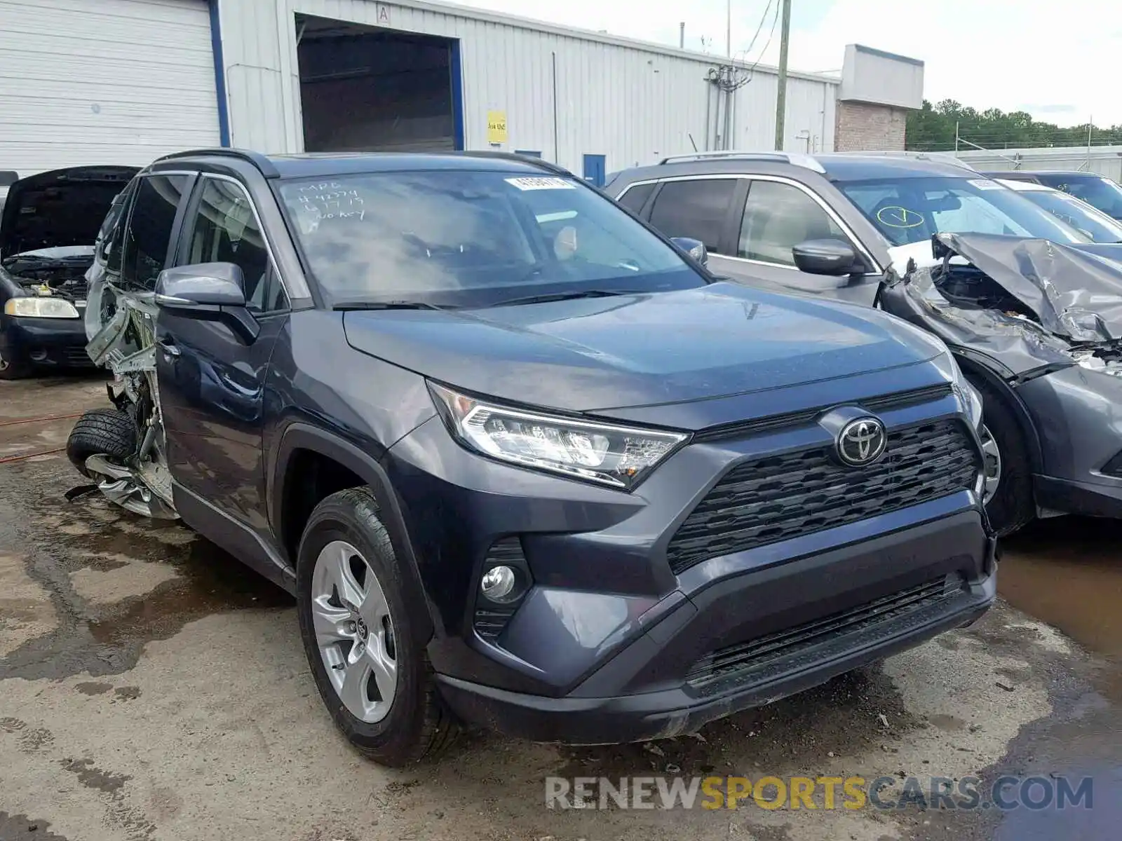 1 Photograph of a damaged car JTMW1RFV9KD004414 TOYOTA RAV4 XLE 2019