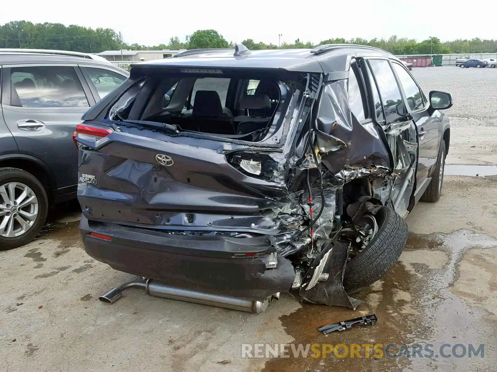 4 Photograph of a damaged car JTMW1RFV9KD004414 TOYOTA RAV4 XLE 2019