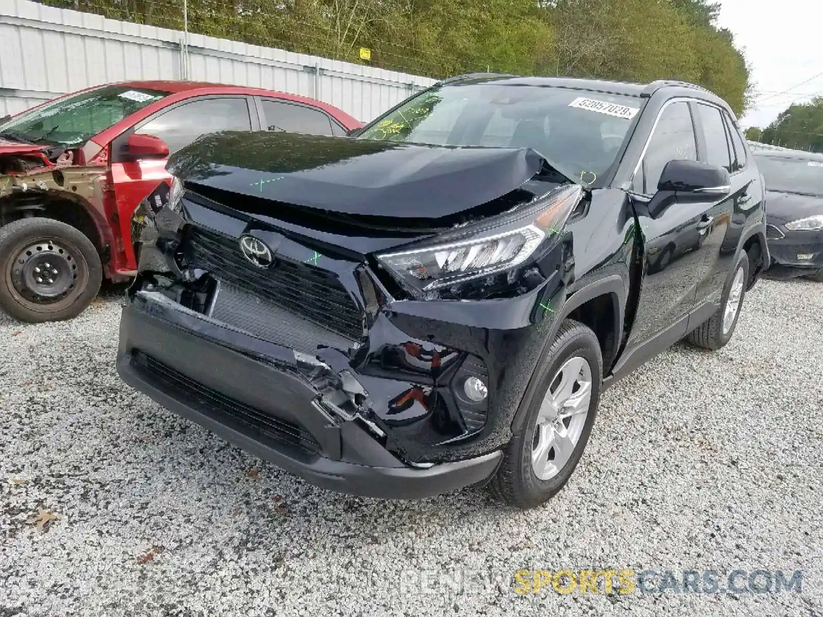 2 Photograph of a damaged car JTMW1RFV9KD008155 TOYOTA RAV4 XLE 2019