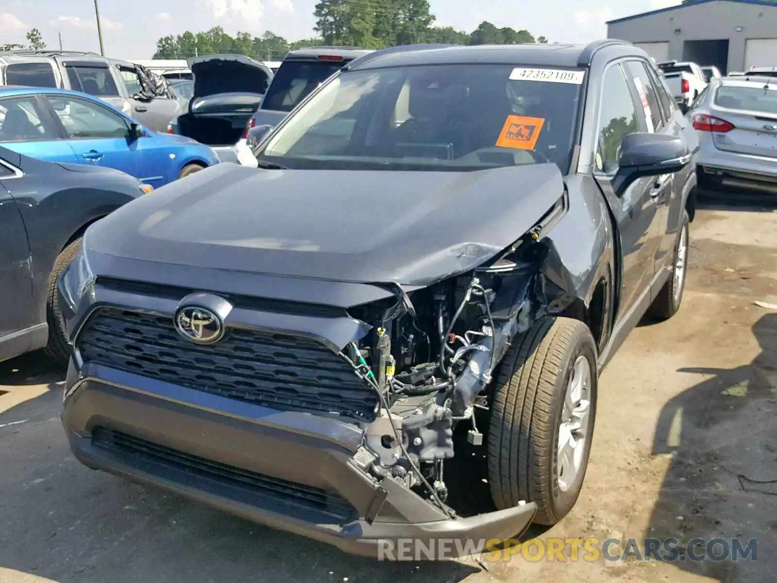 2 Photograph of a damaged car JTMW1RFV9KD010472 TOYOTA RAV4 XLE 2019