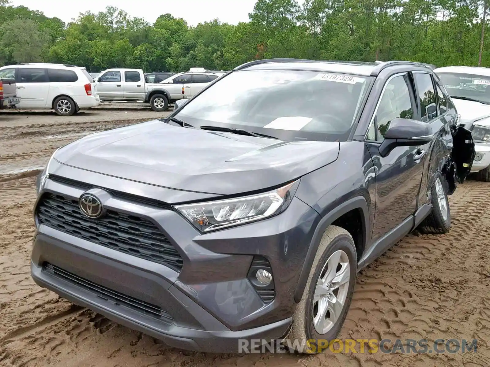 2 Photograph of a damaged car JTMW1RFV9KD011945 TOYOTA RAV4 XLE 2019