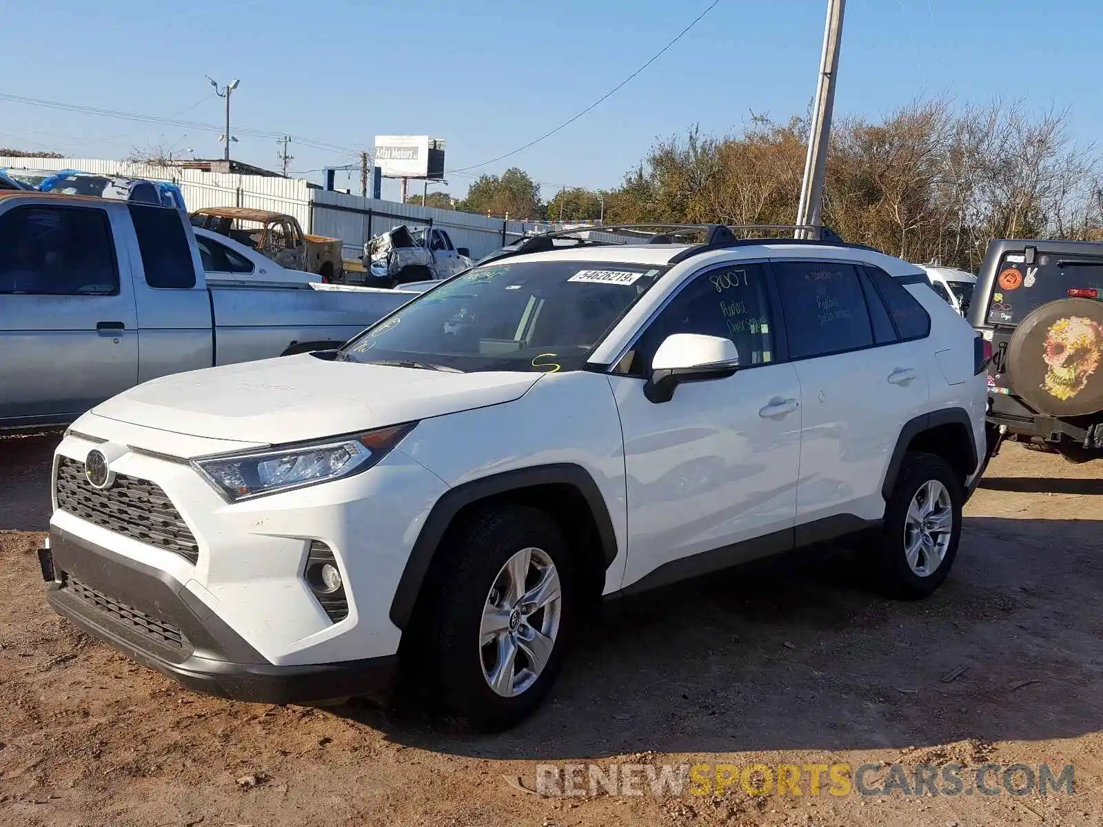 2 Photograph of a damaged car JTMW1RFV9KD024341 TOYOTA RAV4 XLE 2019