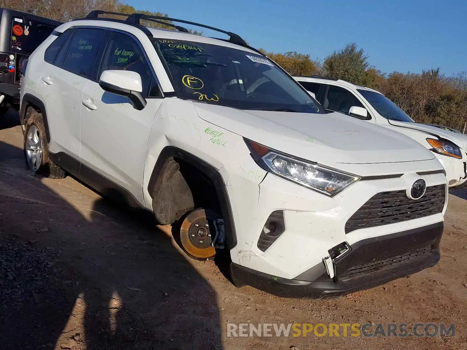 9 Photograph of a damaged car JTMW1RFV9KD024341 TOYOTA RAV4 XLE 2019