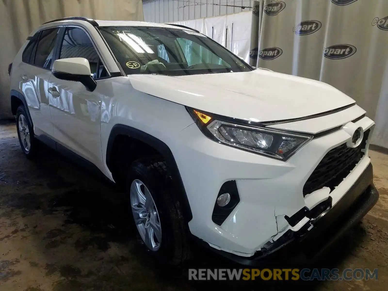 1 Photograph of a damaged car JTMW1RFVXKD021772 TOYOTA RAV4 XLE 2019