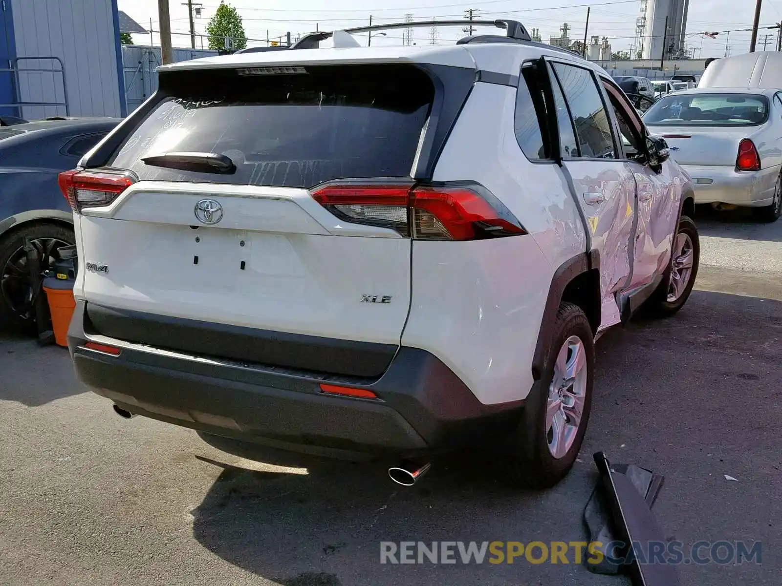 4 Photograph of a damaged car JTMW1RFVXKD509300 TOYOTA RAV4 XLE 2019