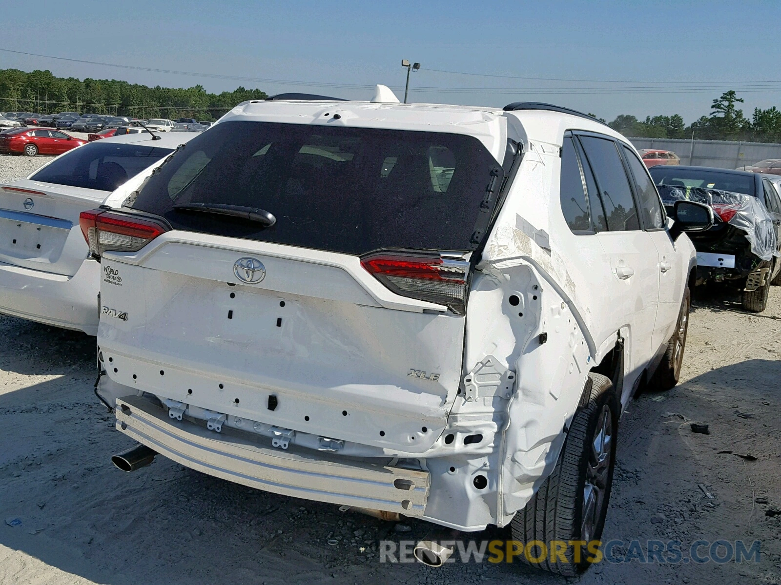 4 Photograph of a damaged car 2T3C1RFV2KC012748 TOYOTA RAV4 XLE P 2019