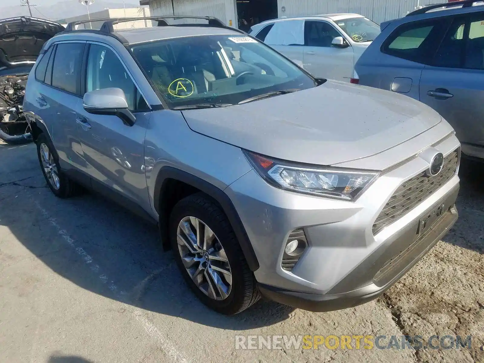 1 Photograph of a damaged car 2T3C1RFV3KW023885 TOYOTA RAV4 XLE P 2019