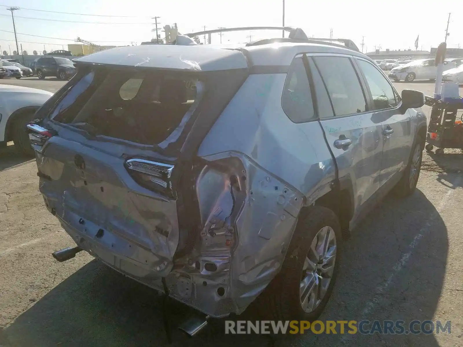 4 Photograph of a damaged car 2T3C1RFV3KW023885 TOYOTA RAV4 XLE P 2019