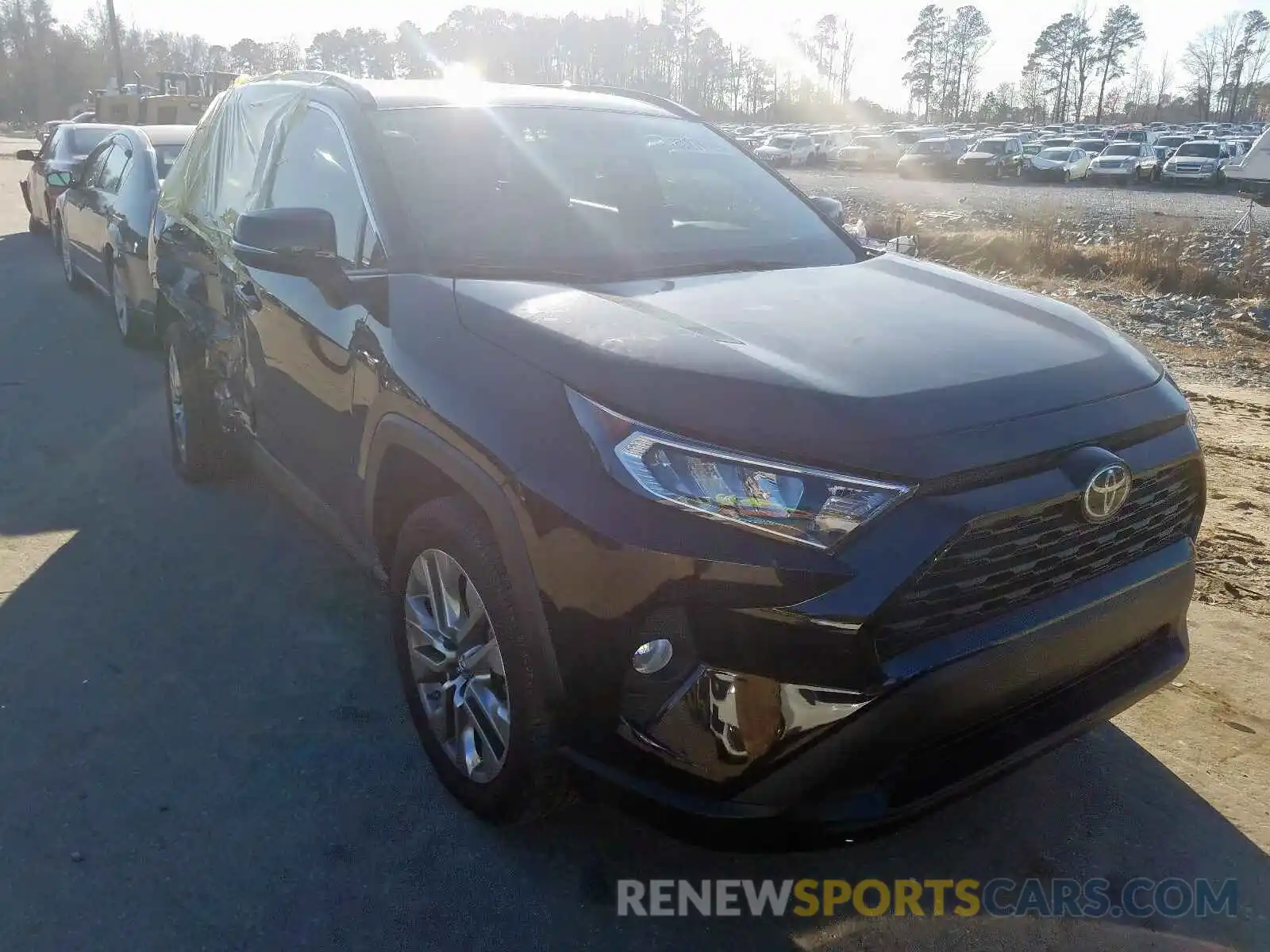 1 Photograph of a damaged car 2T3C1RFVXKC014988 TOYOTA RAV4 XLE P 2019