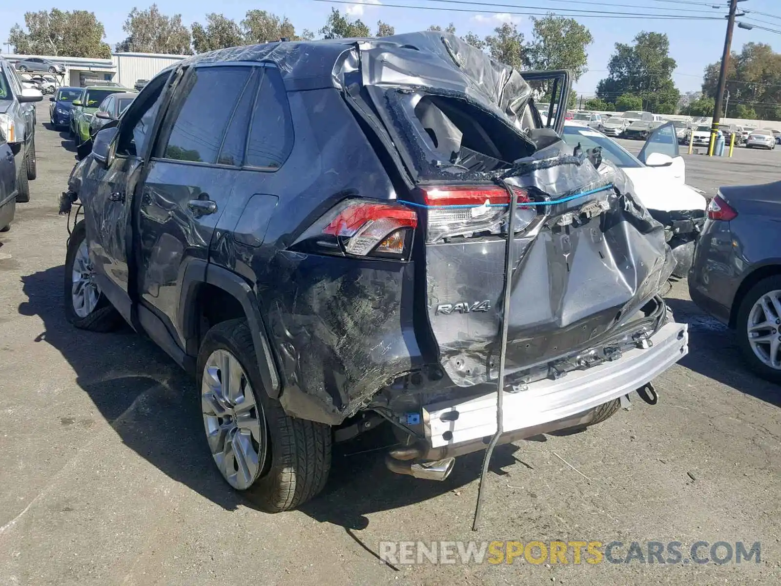 3 Photograph of a damaged car JTMA1RFV0KD026117 TOYOTA RAV4 XLE P 2019