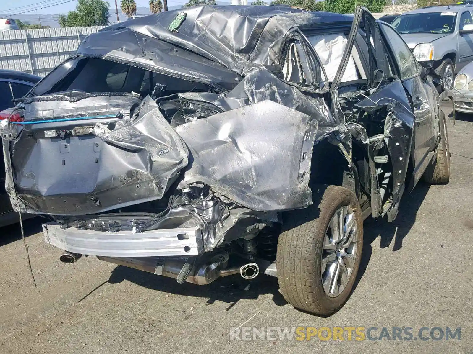 4 Photograph of a damaged car JTMA1RFV0KD026117 TOYOTA RAV4 XLE P 2019