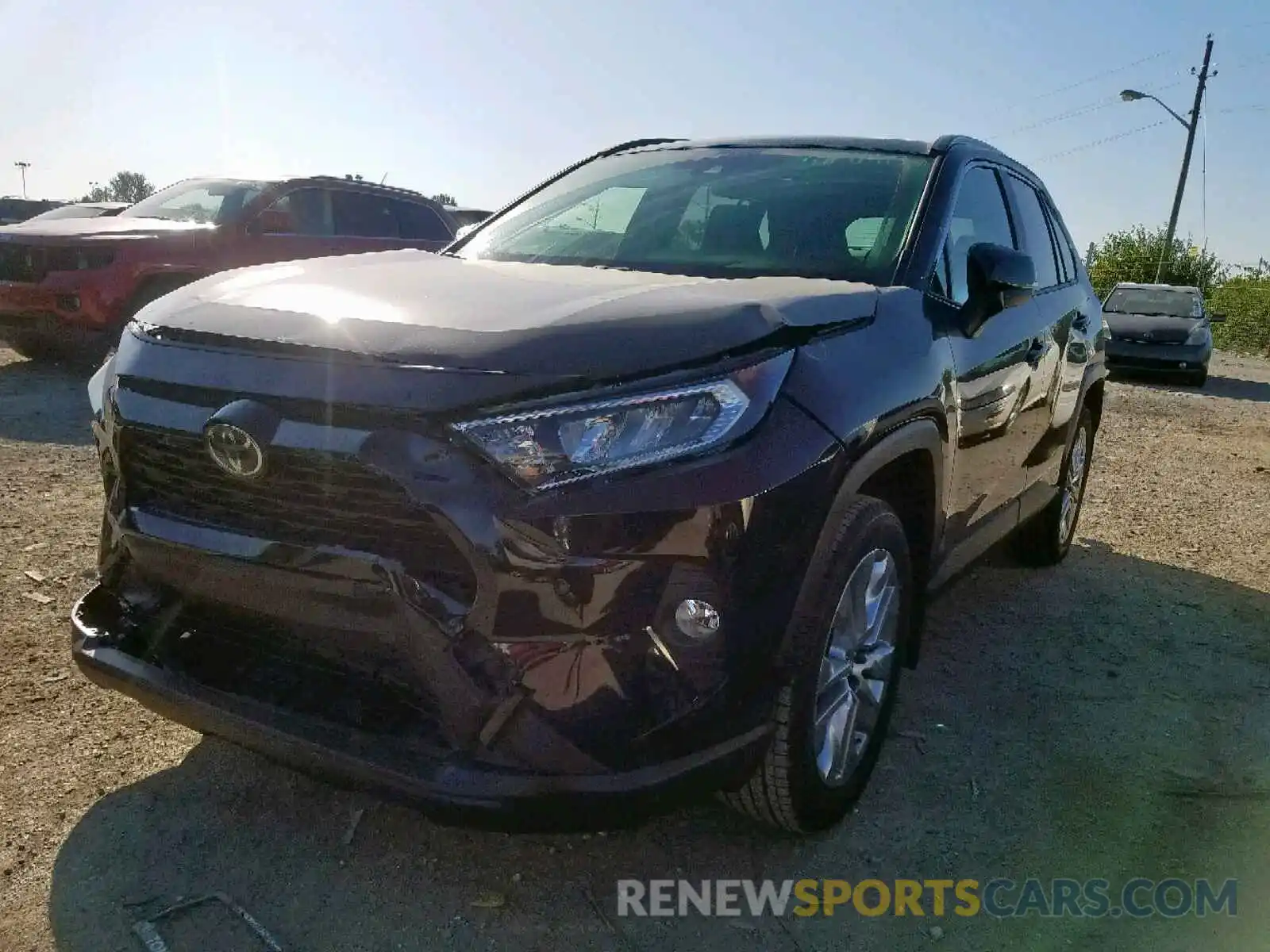 2 Photograph of a damaged car JTMA1RFV0KD038137 TOYOTA RAV4 XLE P 2019