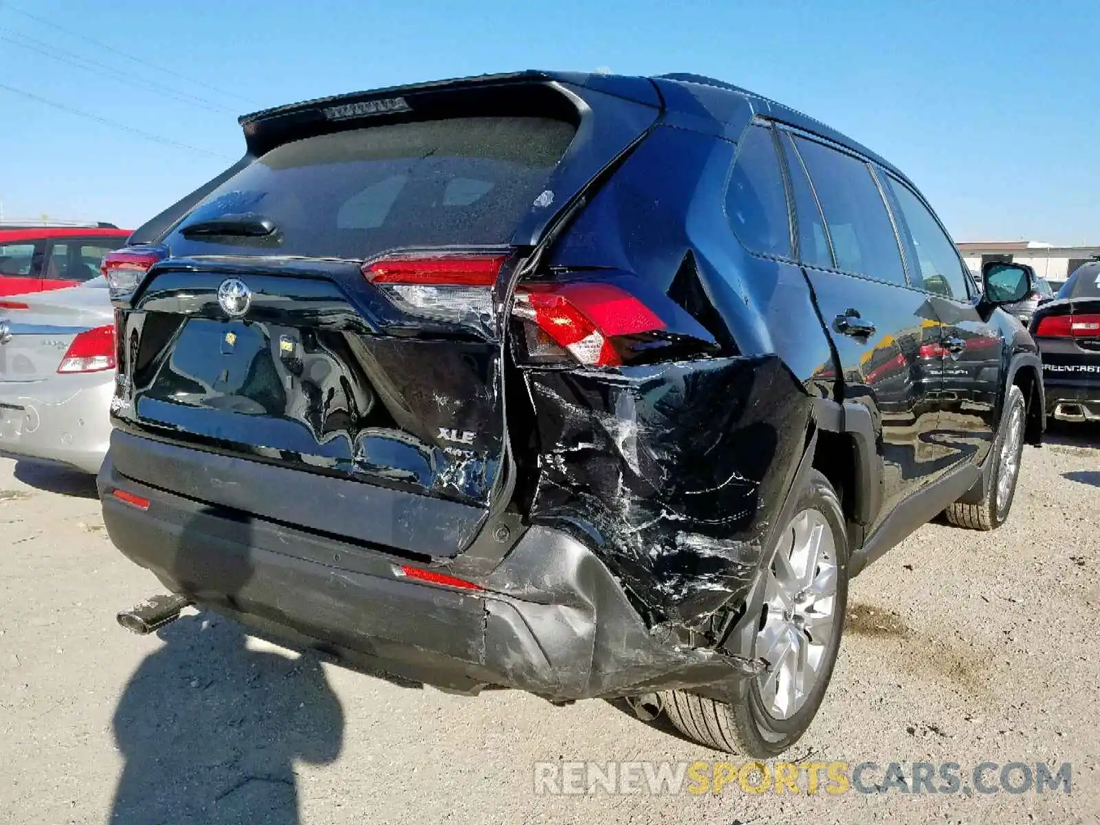 4 Photograph of a damaged car JTMA1RFV0KD038137 TOYOTA RAV4 XLE P 2019