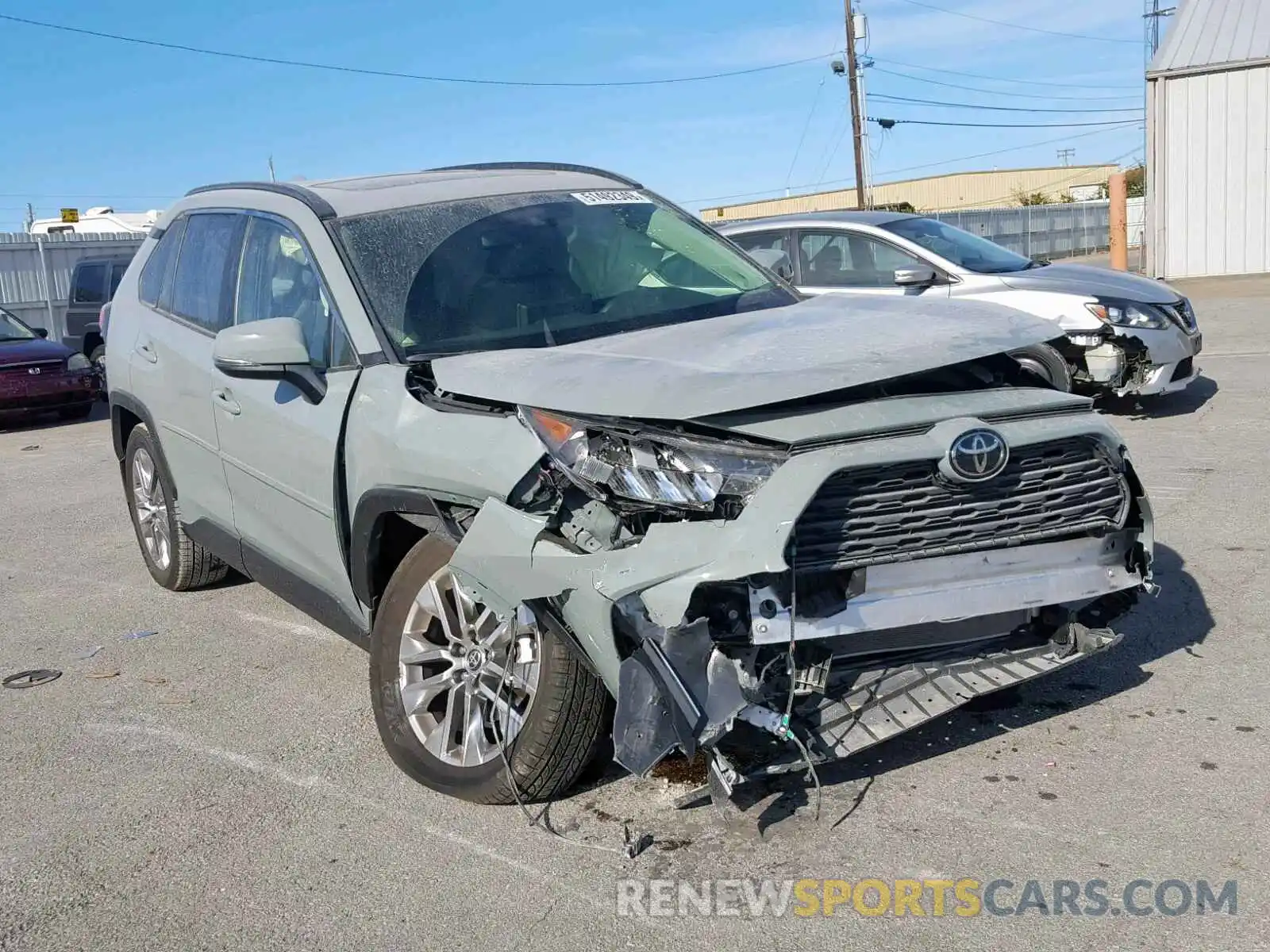 1 Photograph of a damaged car JTMA1RFV2KD014079 TOYOTA RAV4 XLE P 2019