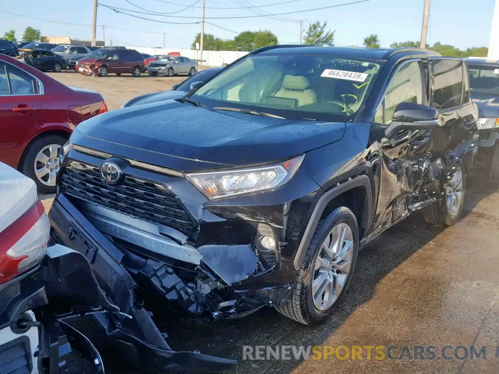 2 Photograph of a damaged car JTMA1RFV2KD015569 TOYOTA RAV4 XLE P 2019